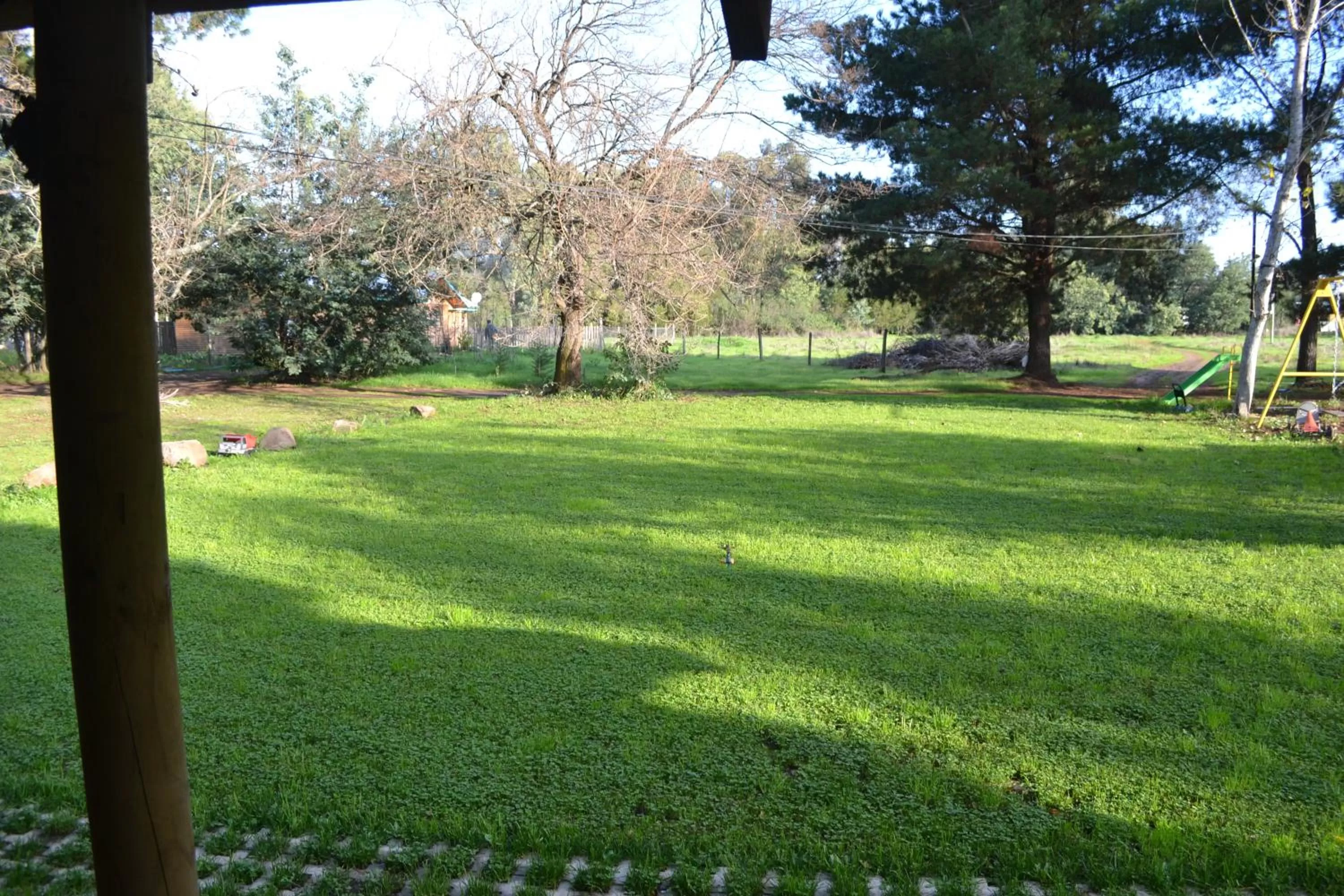 Children play ground in La Casa de Adobe Natural y Más