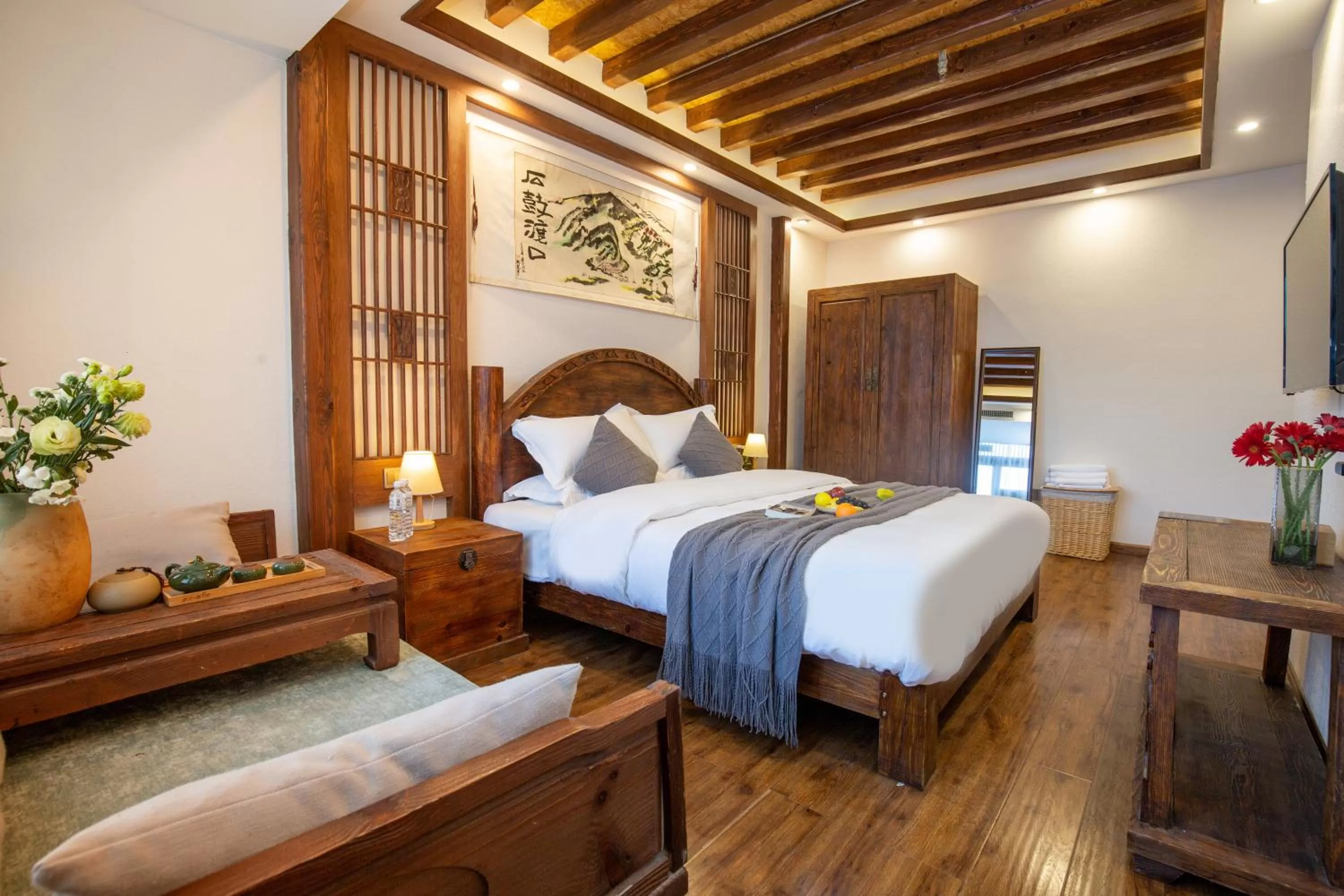 Bed in Lijiang Gemmer Hotel