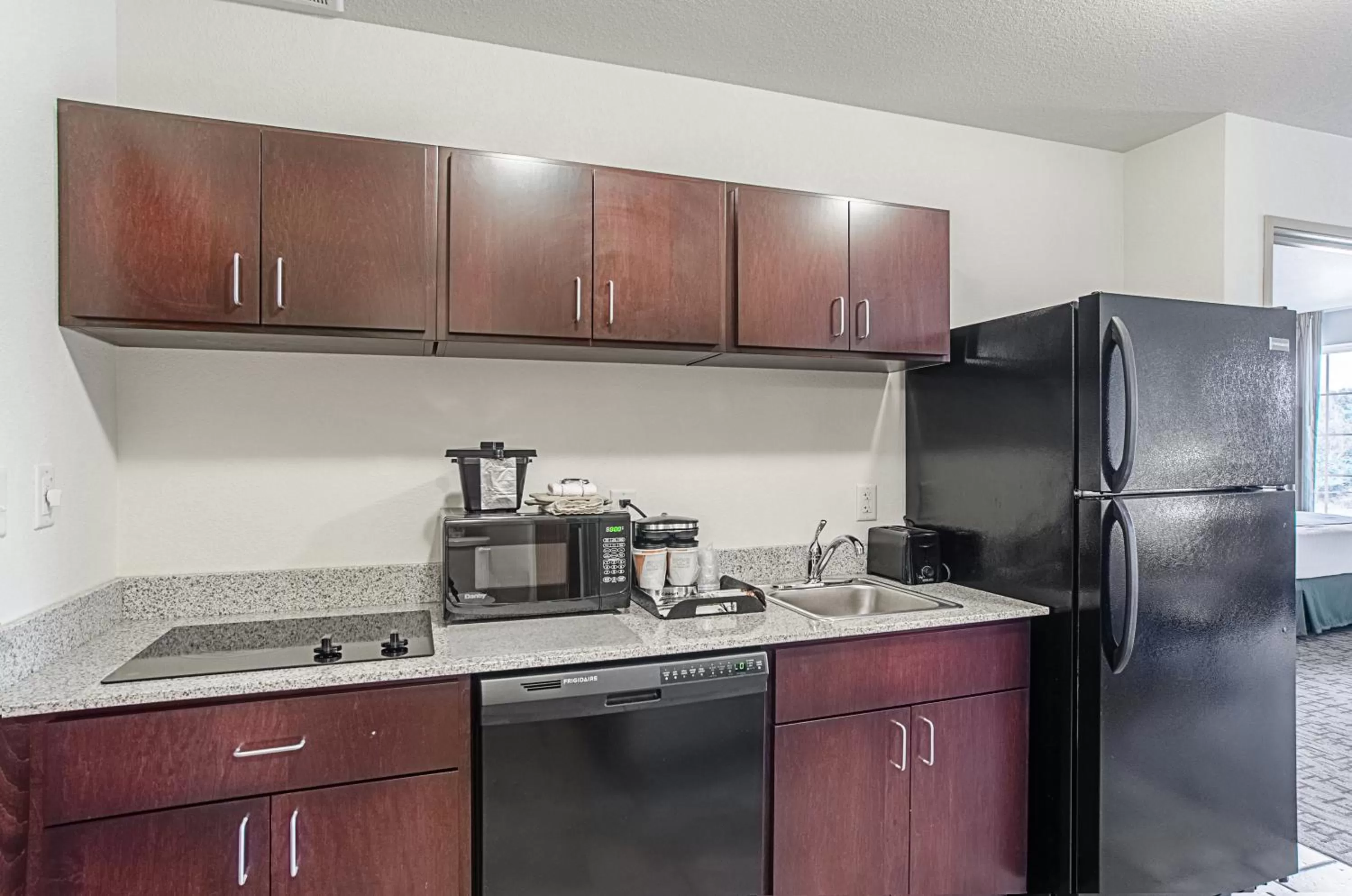 Kitchen or kitchenette in Cobblestone Inn & Suites - Guernsey