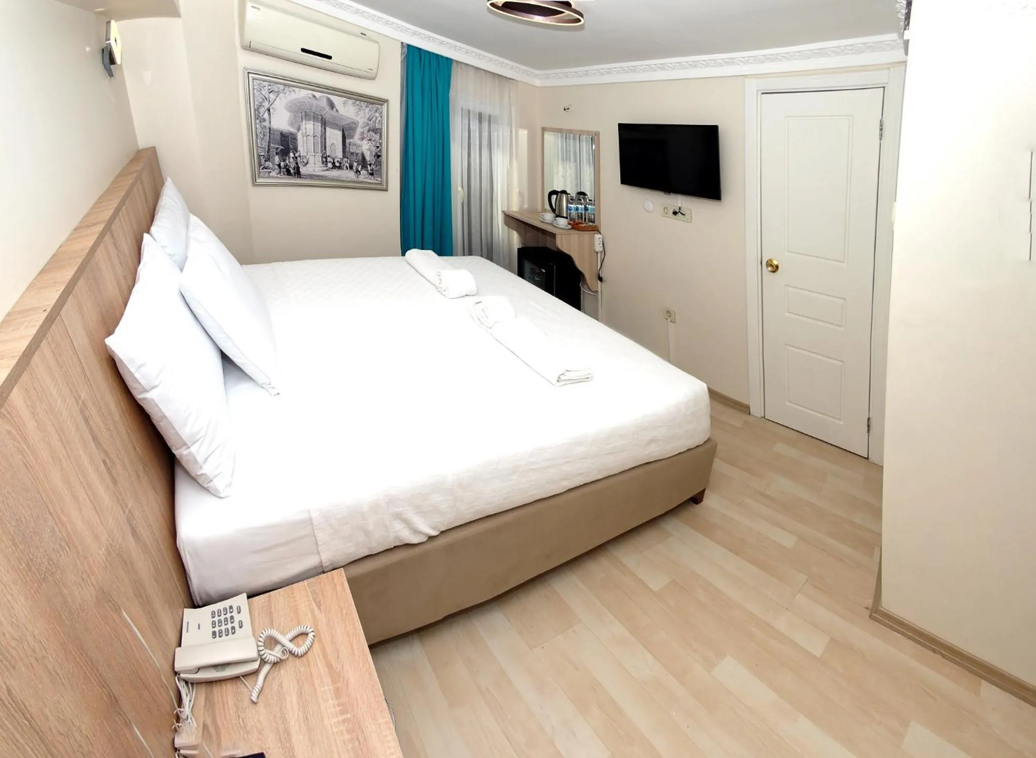 Bed in Le Safran Palace Hotel