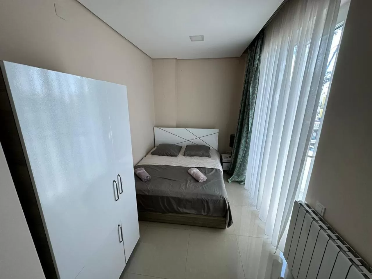 Photo of the whole room, Bed in National+