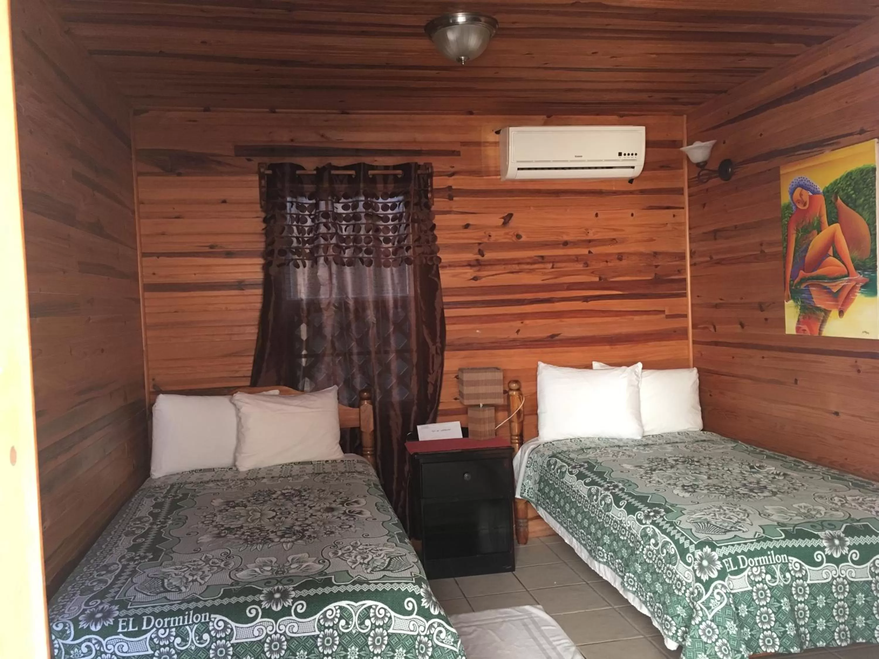 Bed in Blue Wave Guest House