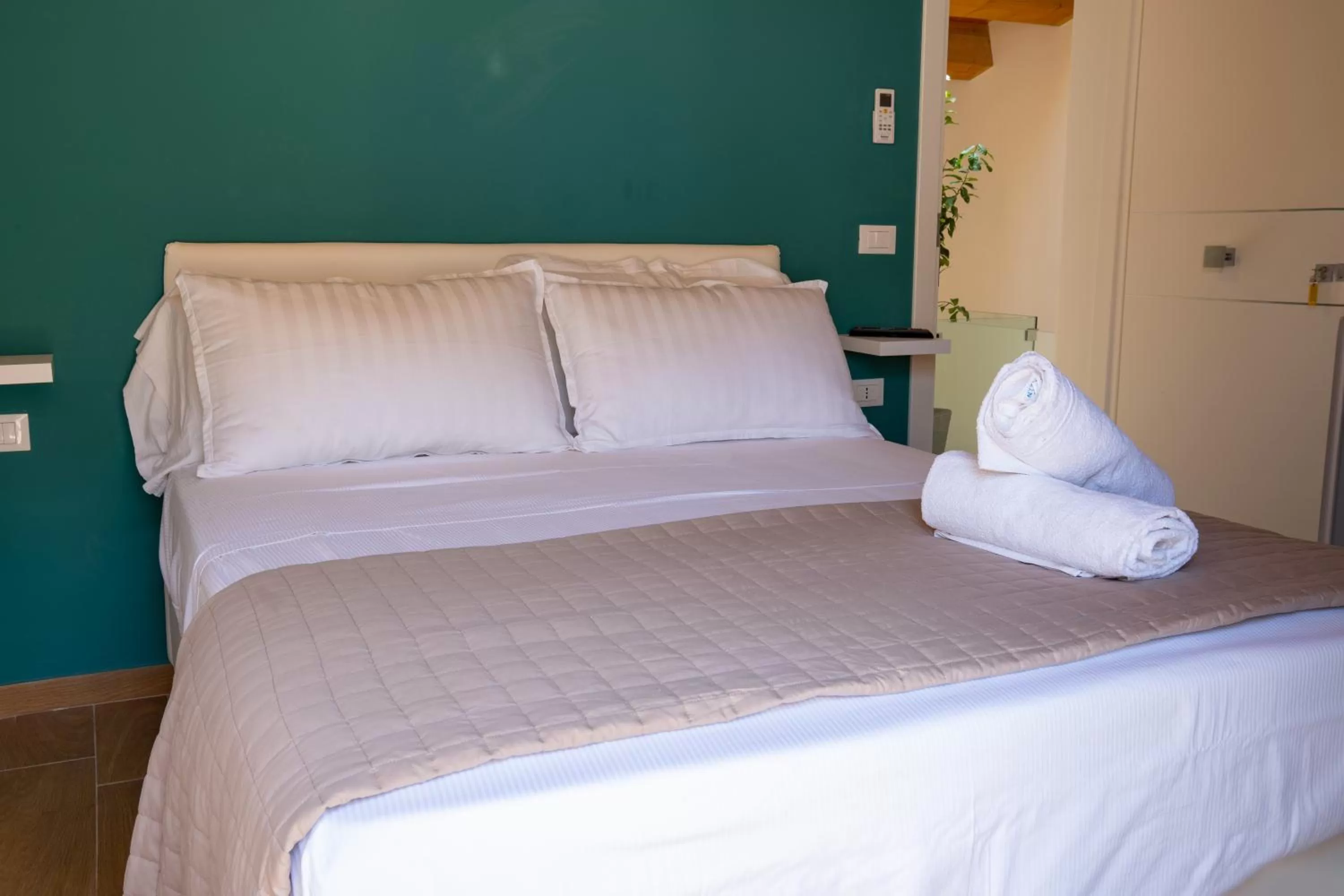 Bed in Verdirooms158