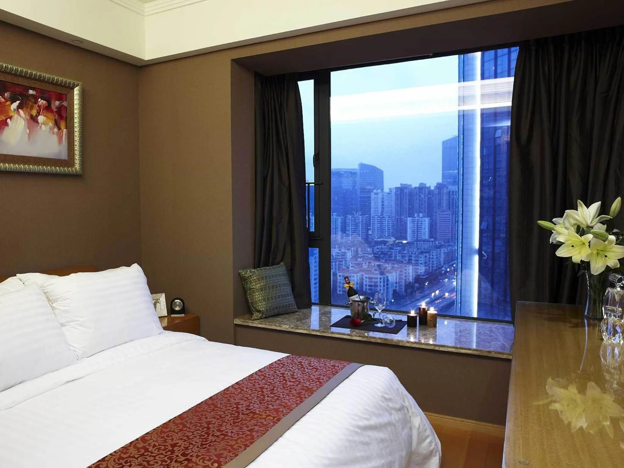 Bed in 广州丹顿行政公寓-Dan Executive Apartment Guangzhou Zhujiang New Town