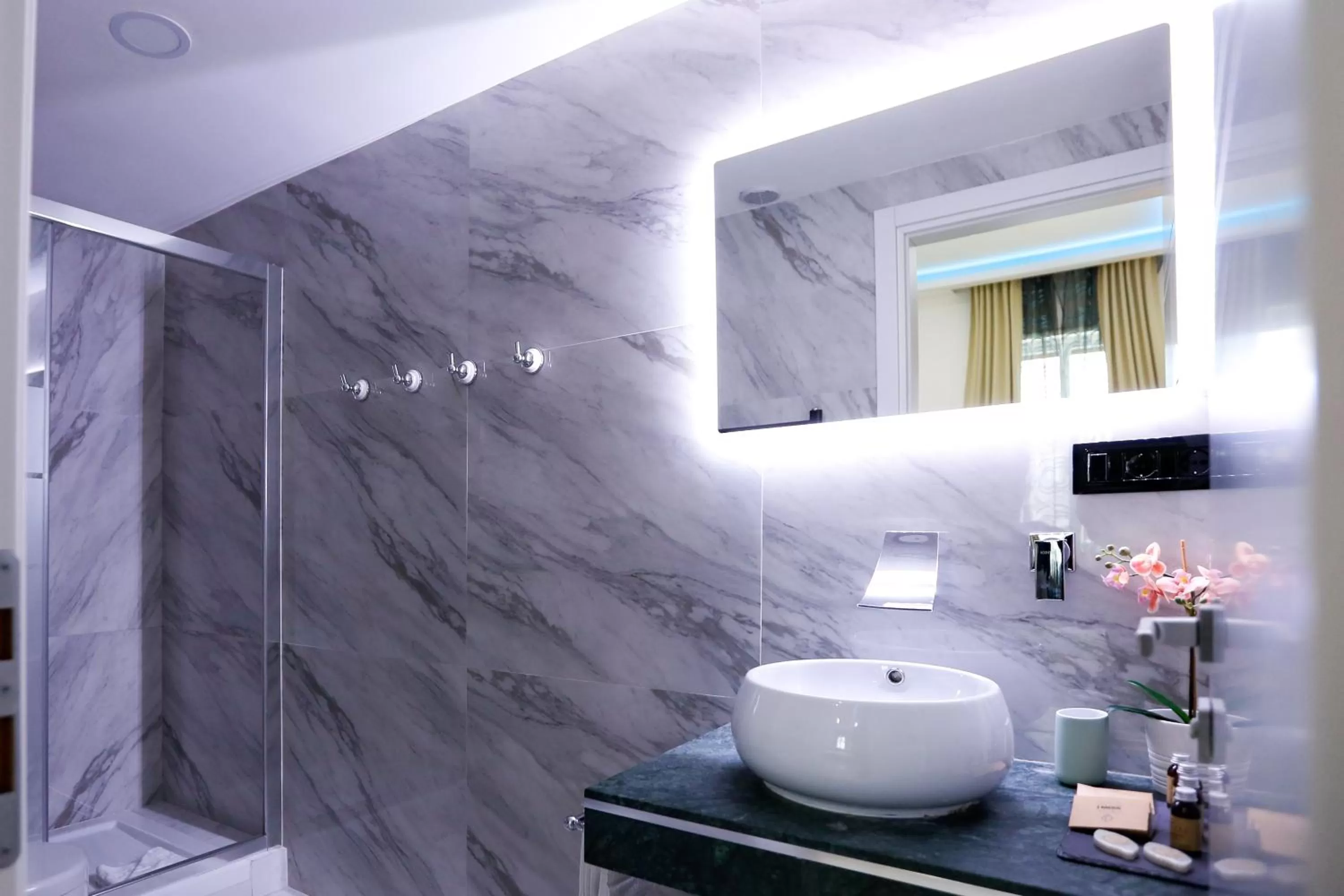 Bathroom in Escape Luxury Suite - CA Domus Collection