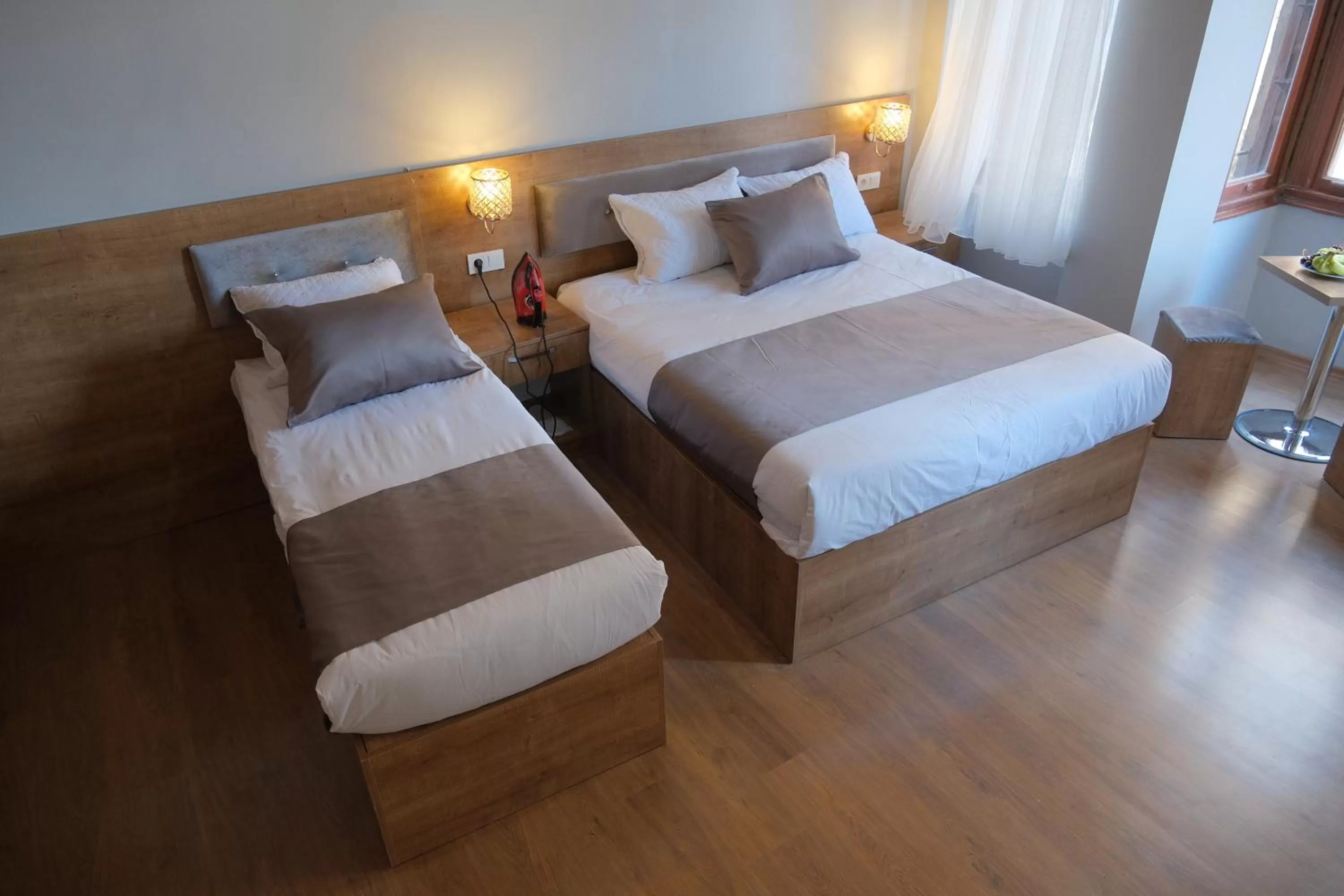 Bed in Adamantides Hotel