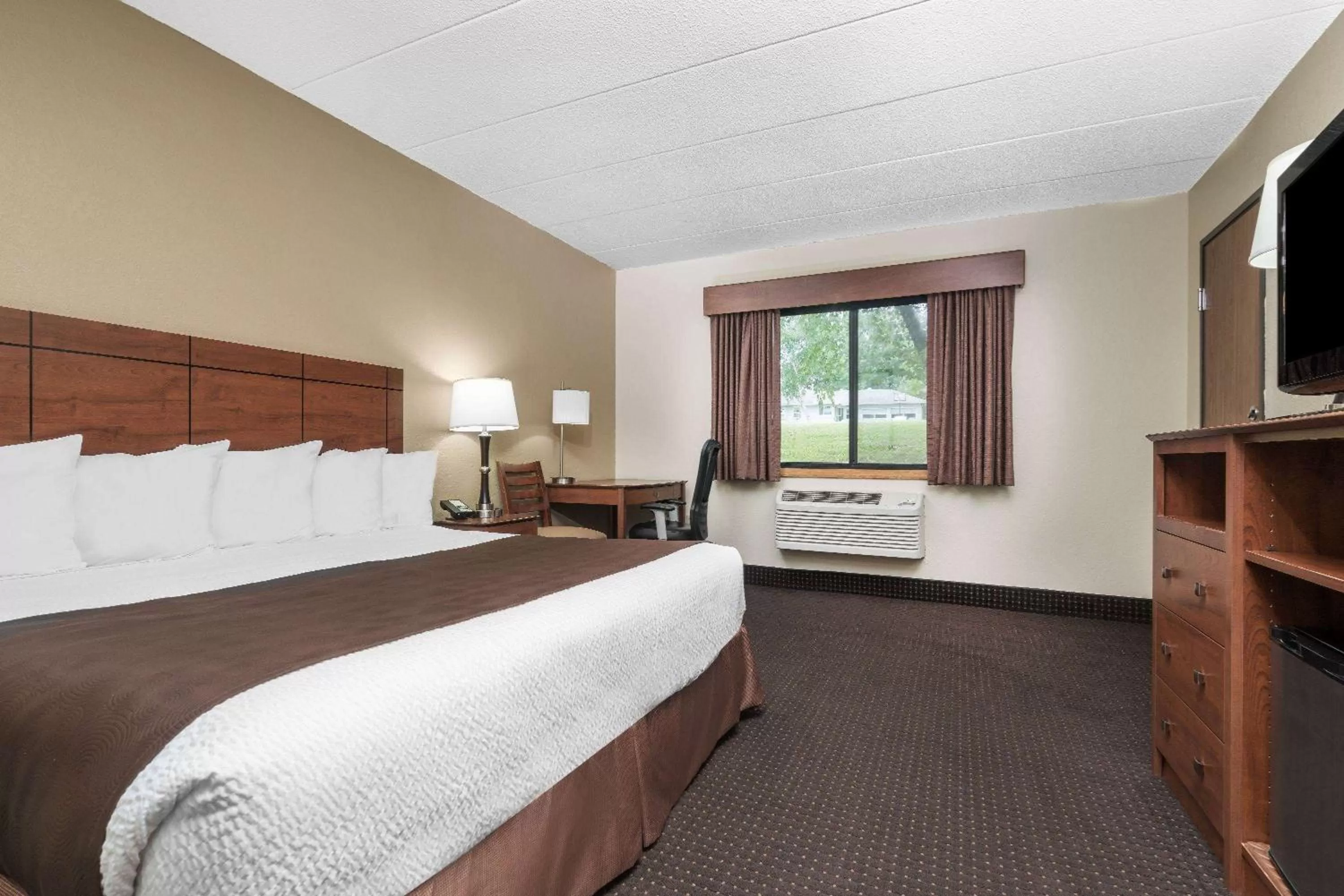 Photo of the whole room, Bed in AmericInn by Wyndham Lake City