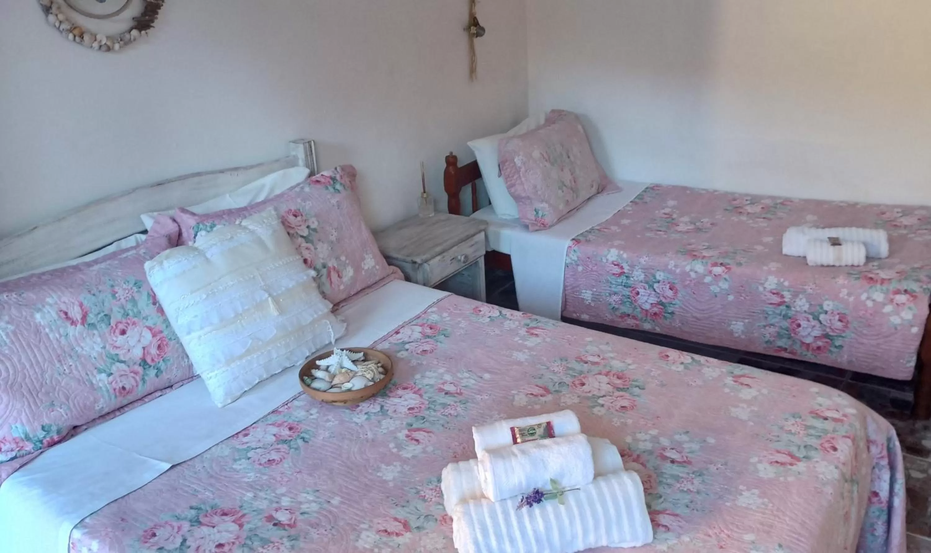 Bed in Hibiscos Pousada