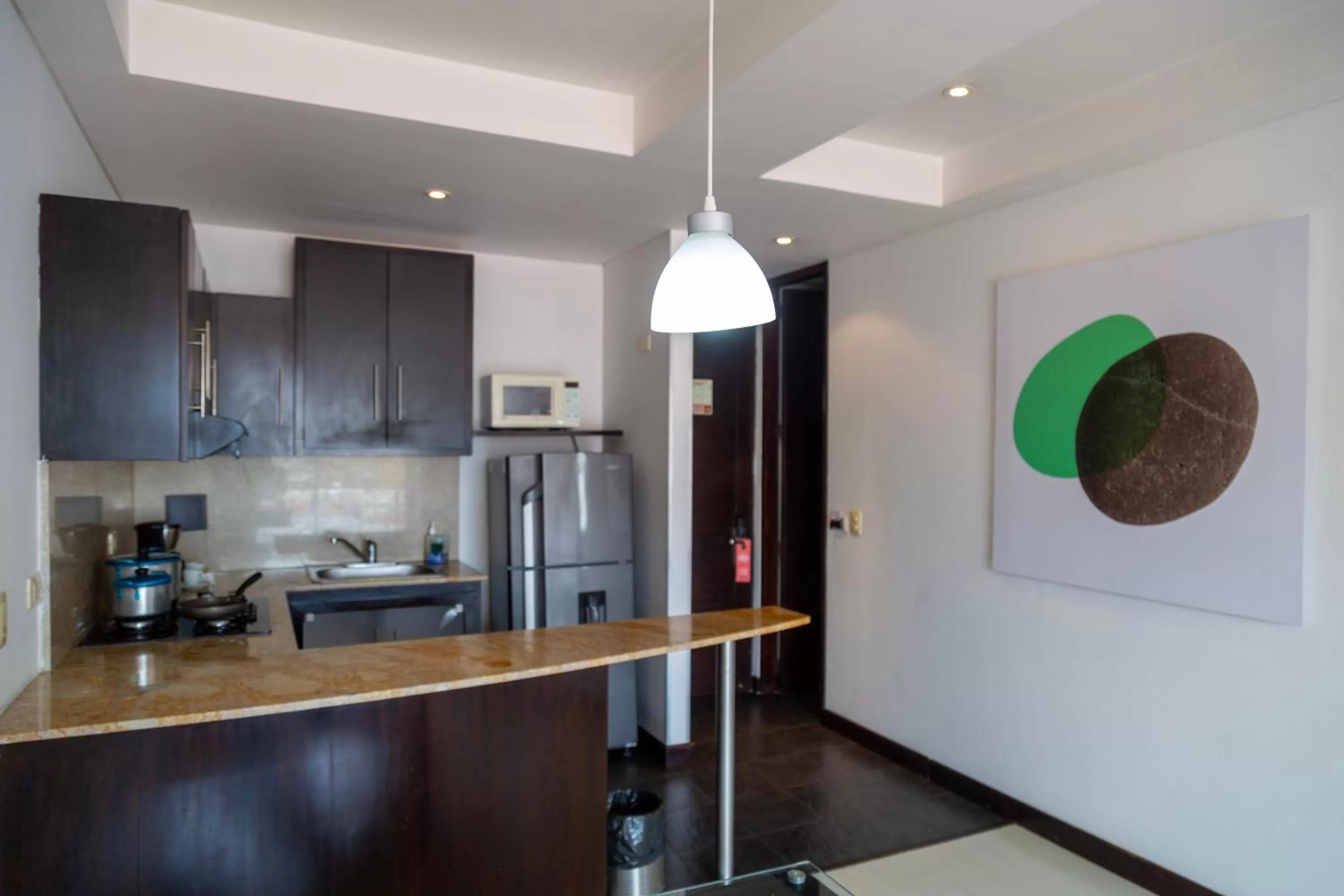 Kitchen or kitchenette in Hotel 104 Art Suites