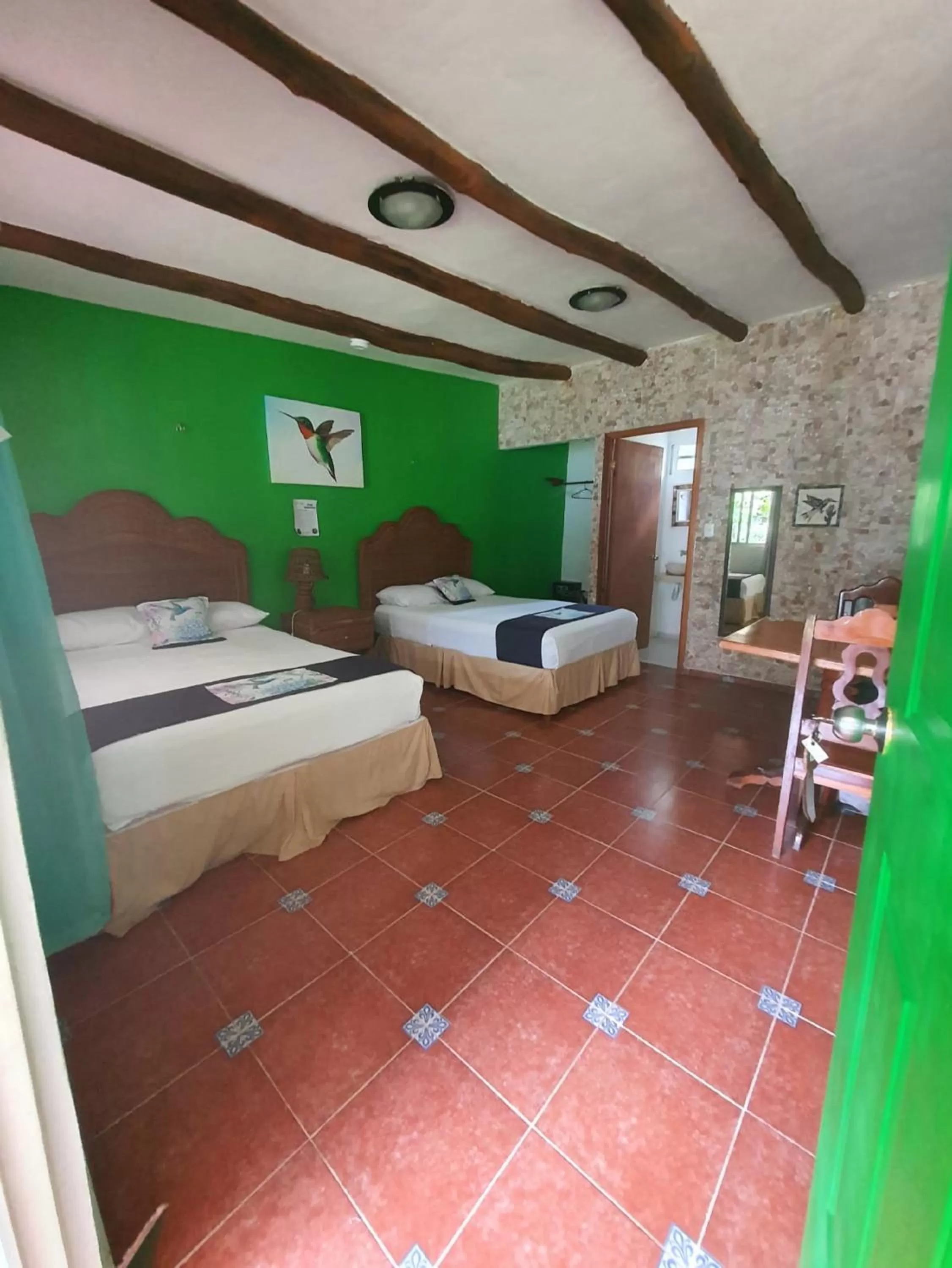 Photo of the whole room, Bed in Cabañas Colibrí