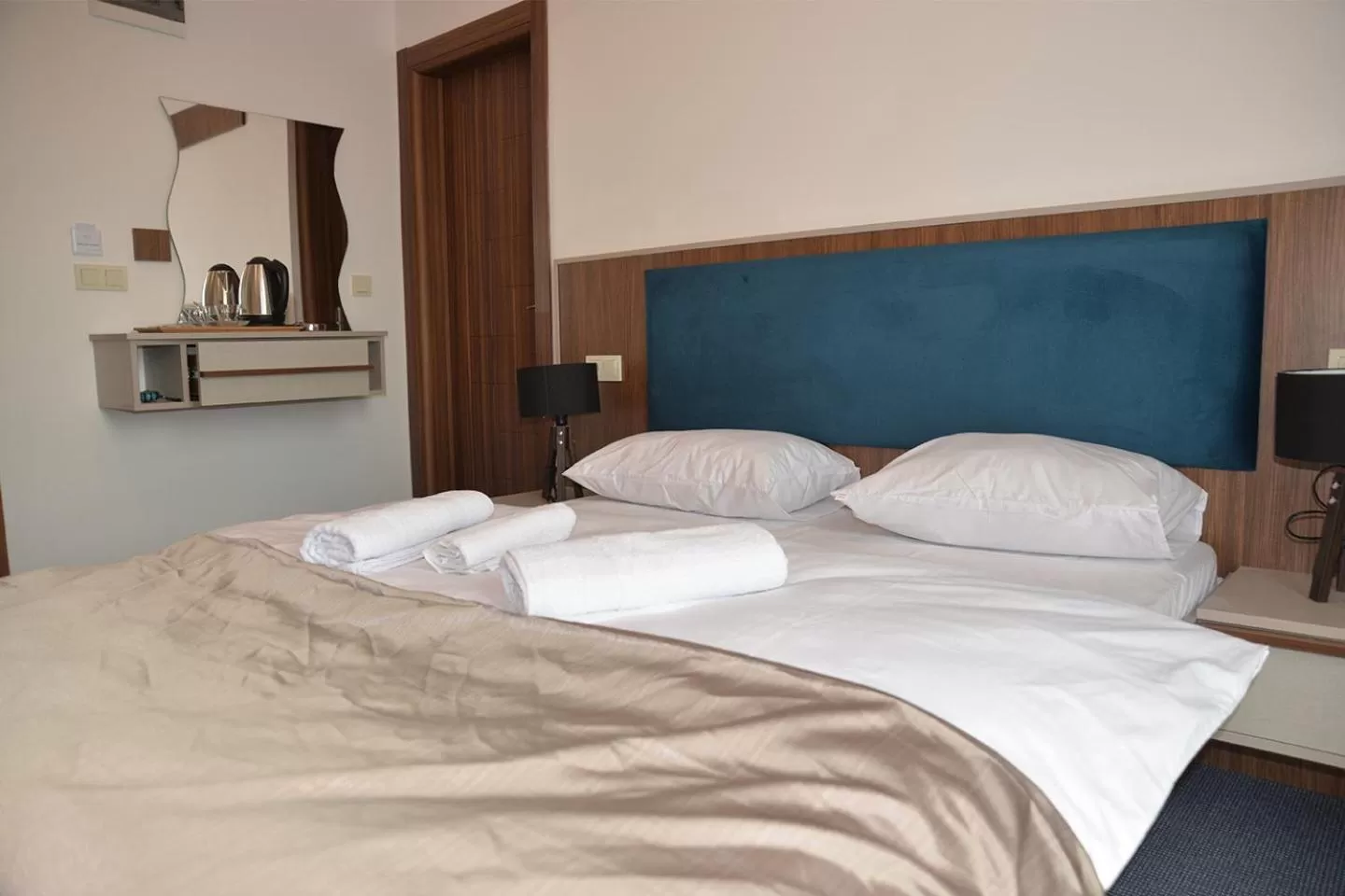 Bed in TEVETOGLU HOTEL