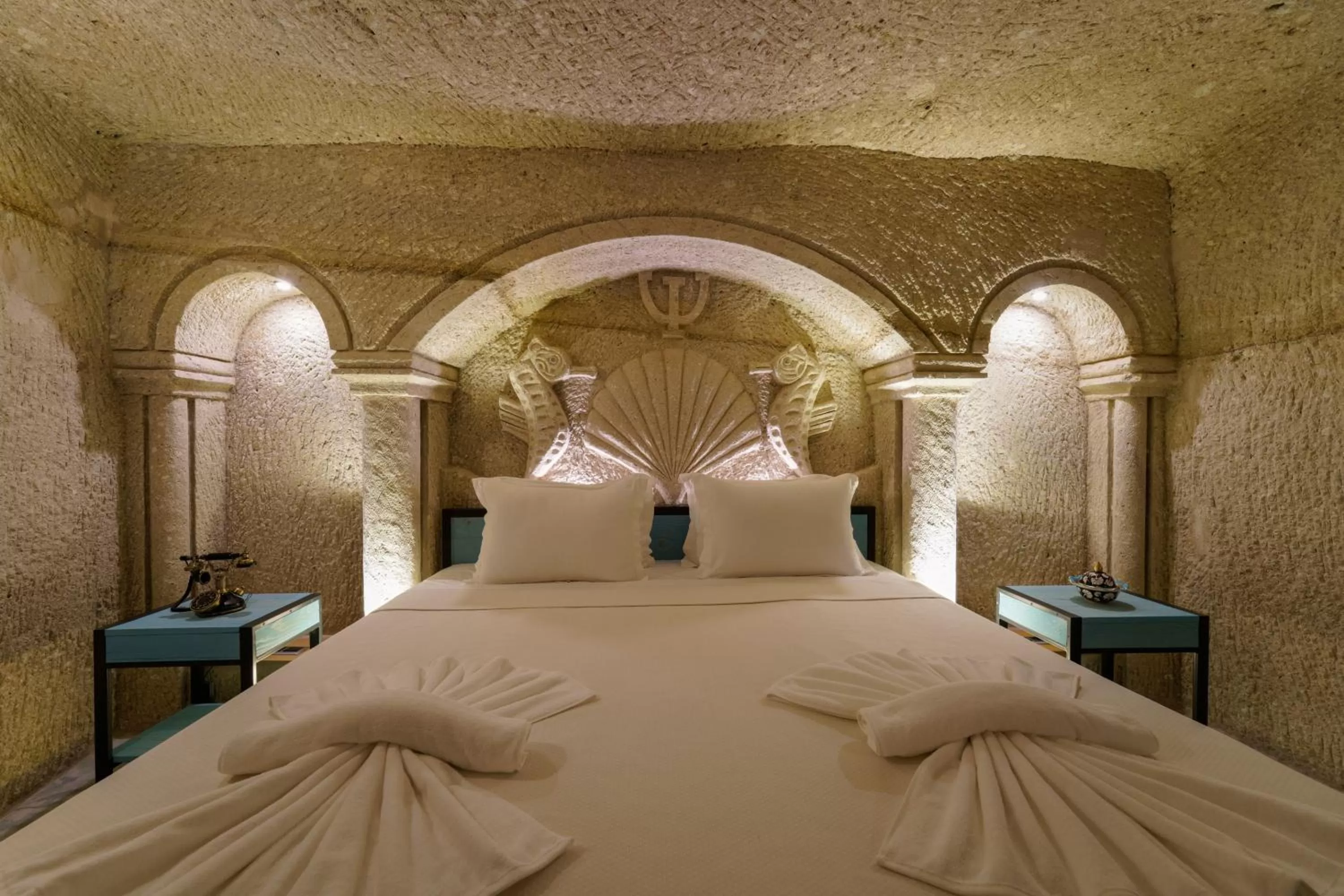 Bed in The Niche Cave Hotel