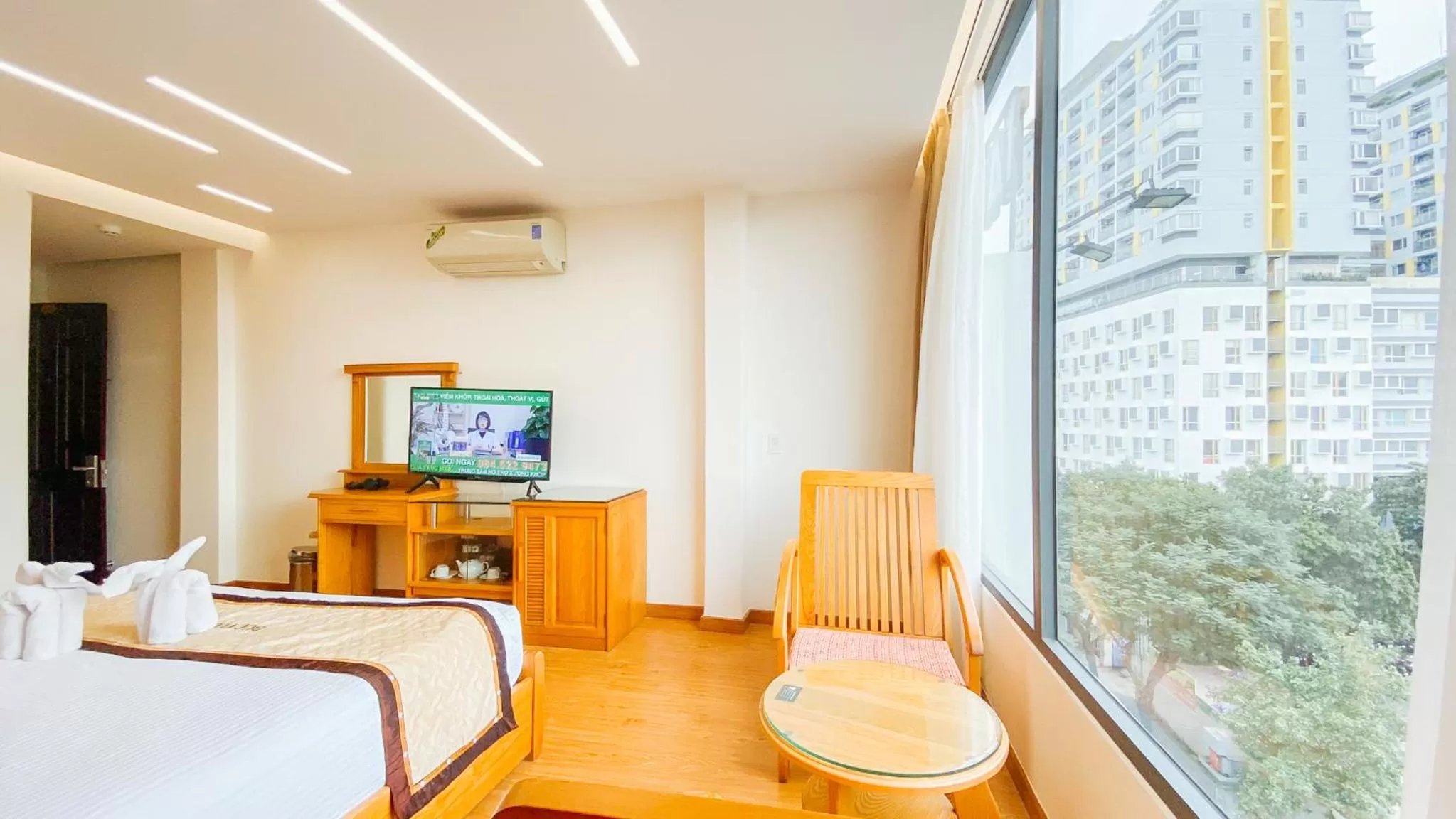 Communal lounge/ TV room, Bed in Duc Vuong Saigon Hotel - Cao Thang