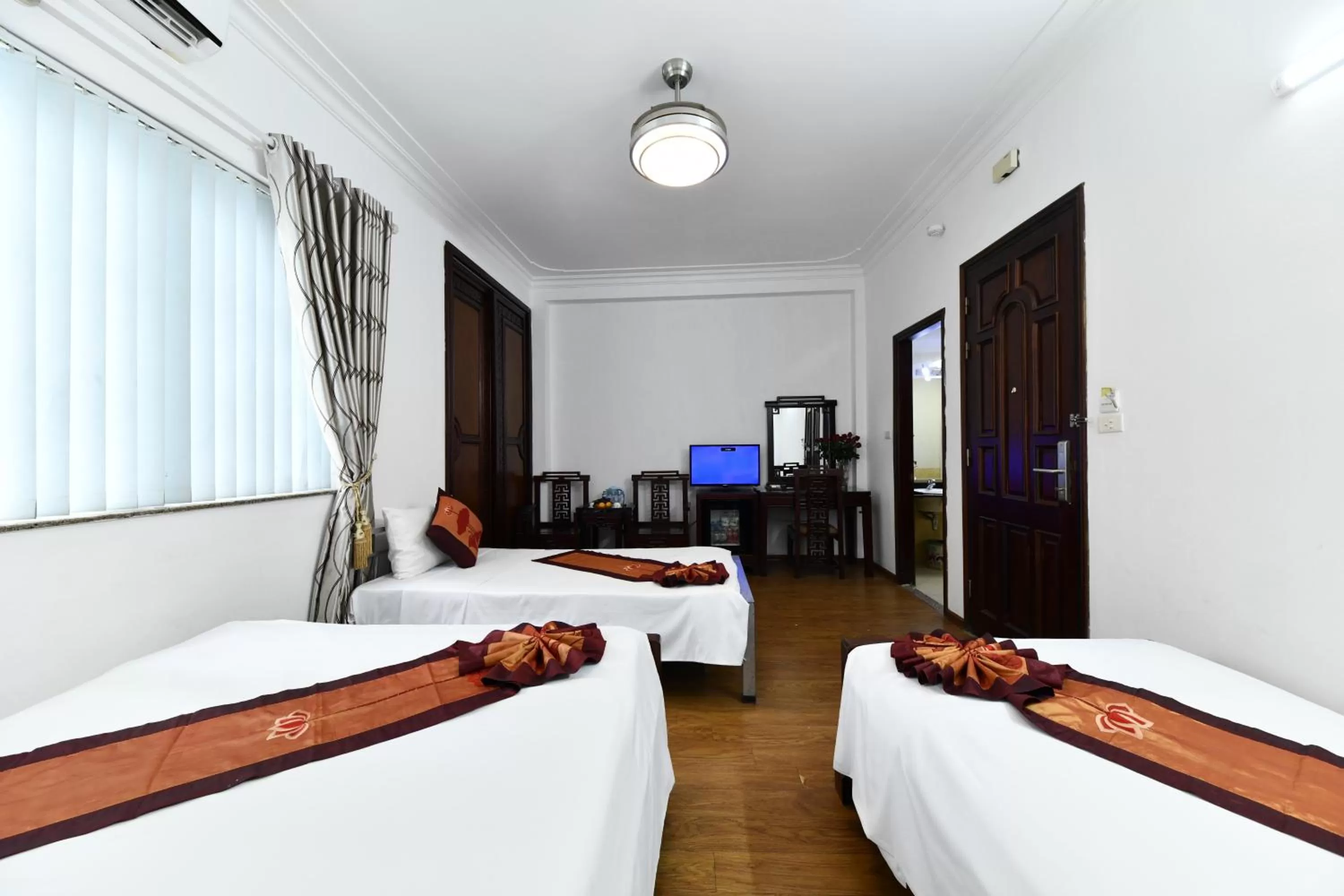 Bed in Phoenix Legend Hotel Hanoi