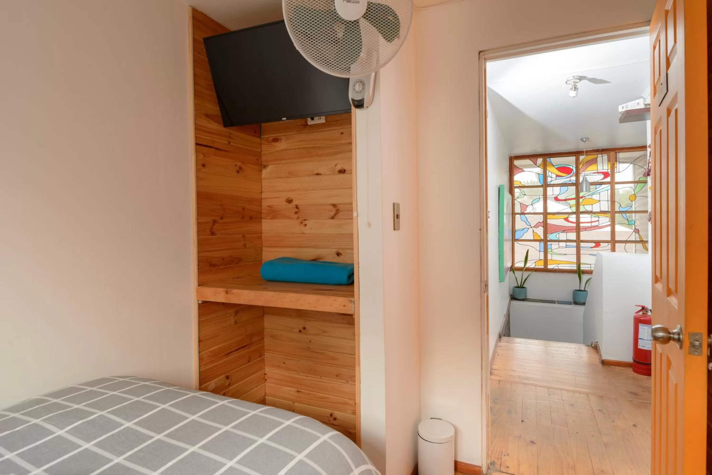 Bedroom, TV/Entertainment Center in Verde Madera Hostel B&B