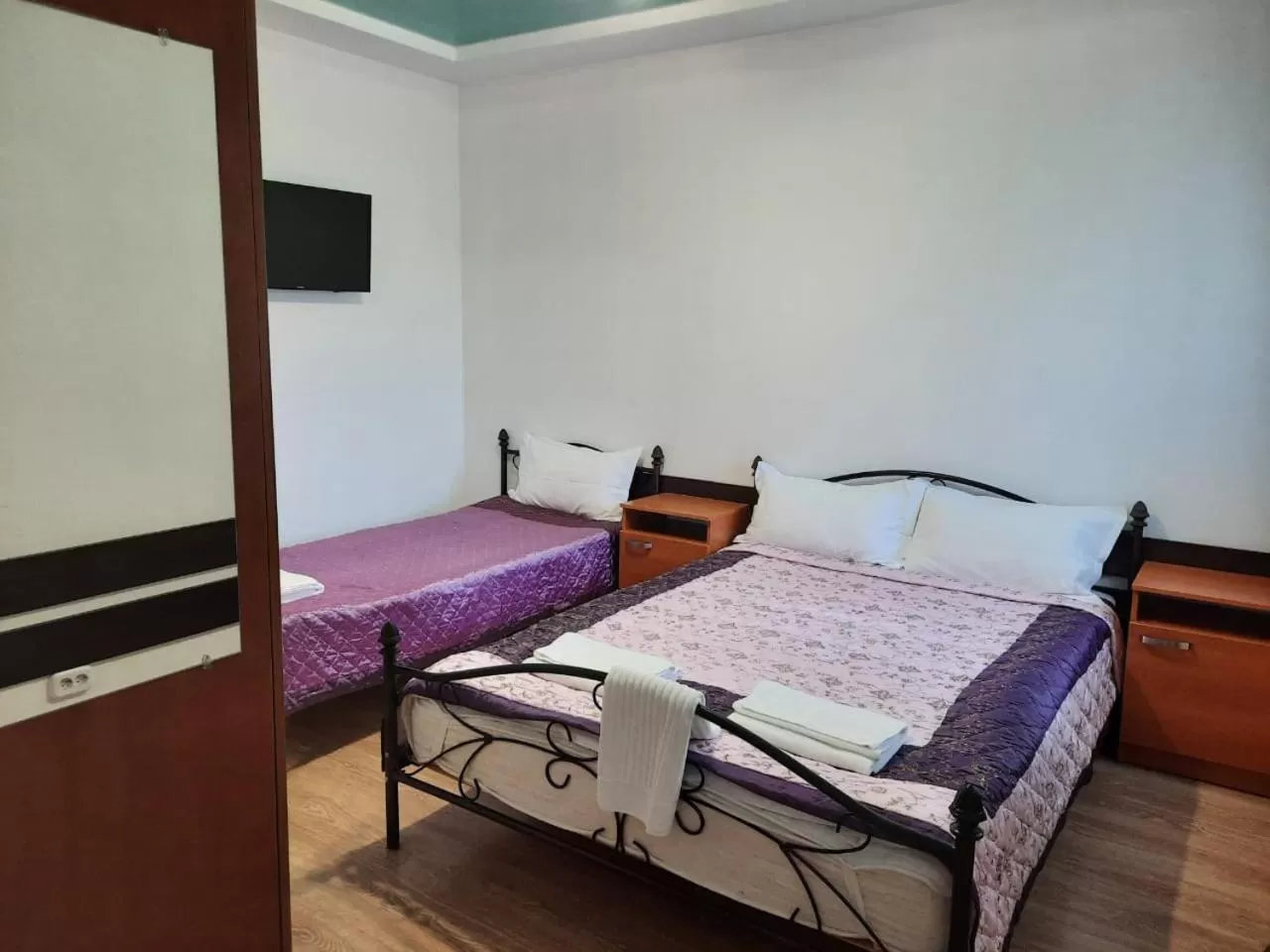 Bed in Zhaylau Hotel