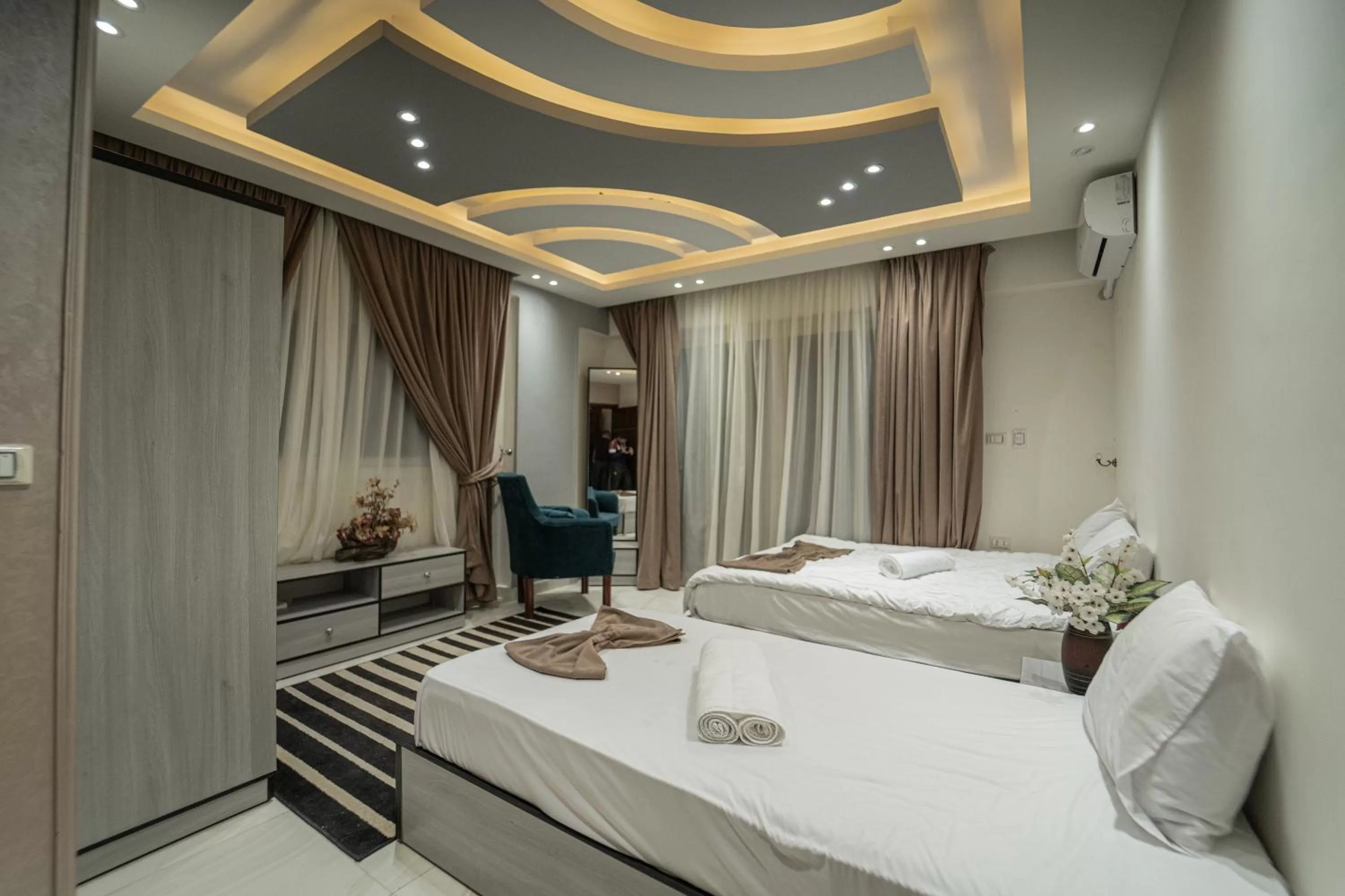 Photo of the whole room, Bed in Gardenia Inn Hotel