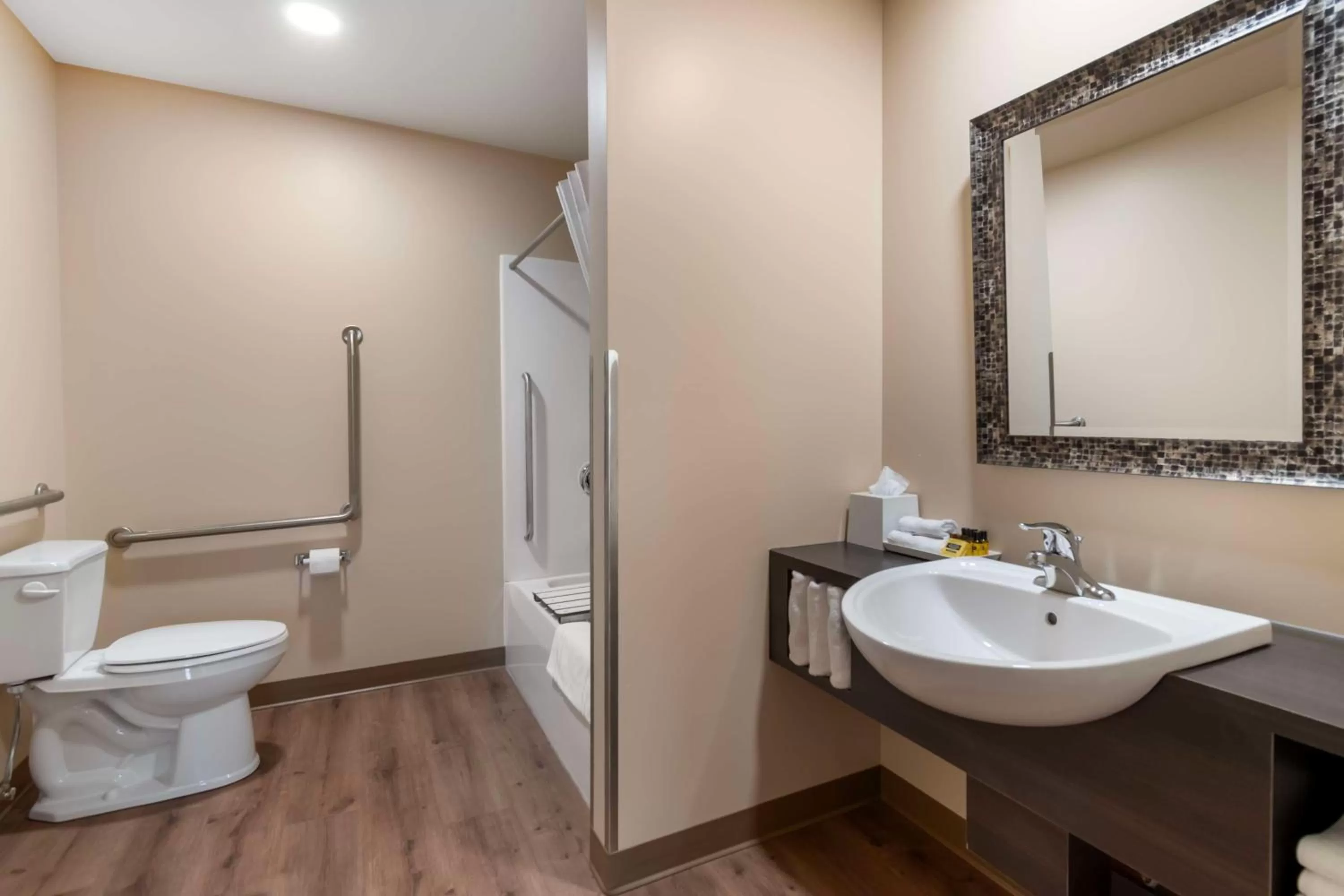 Bathroom in Villa Inn & Suites - SureStay Collection by Best Western