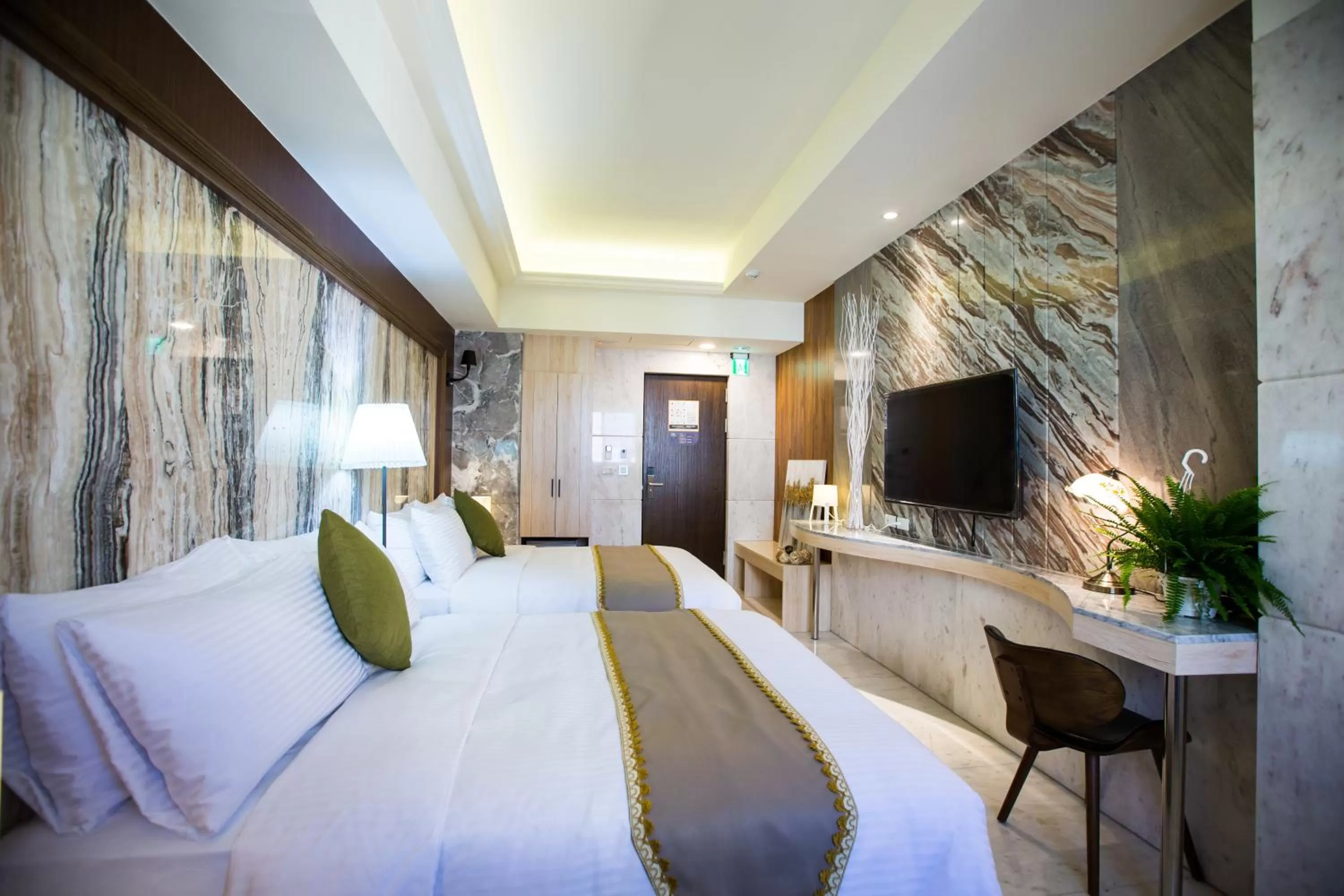 Bed in Hotel Maple Taiwan Boulevard