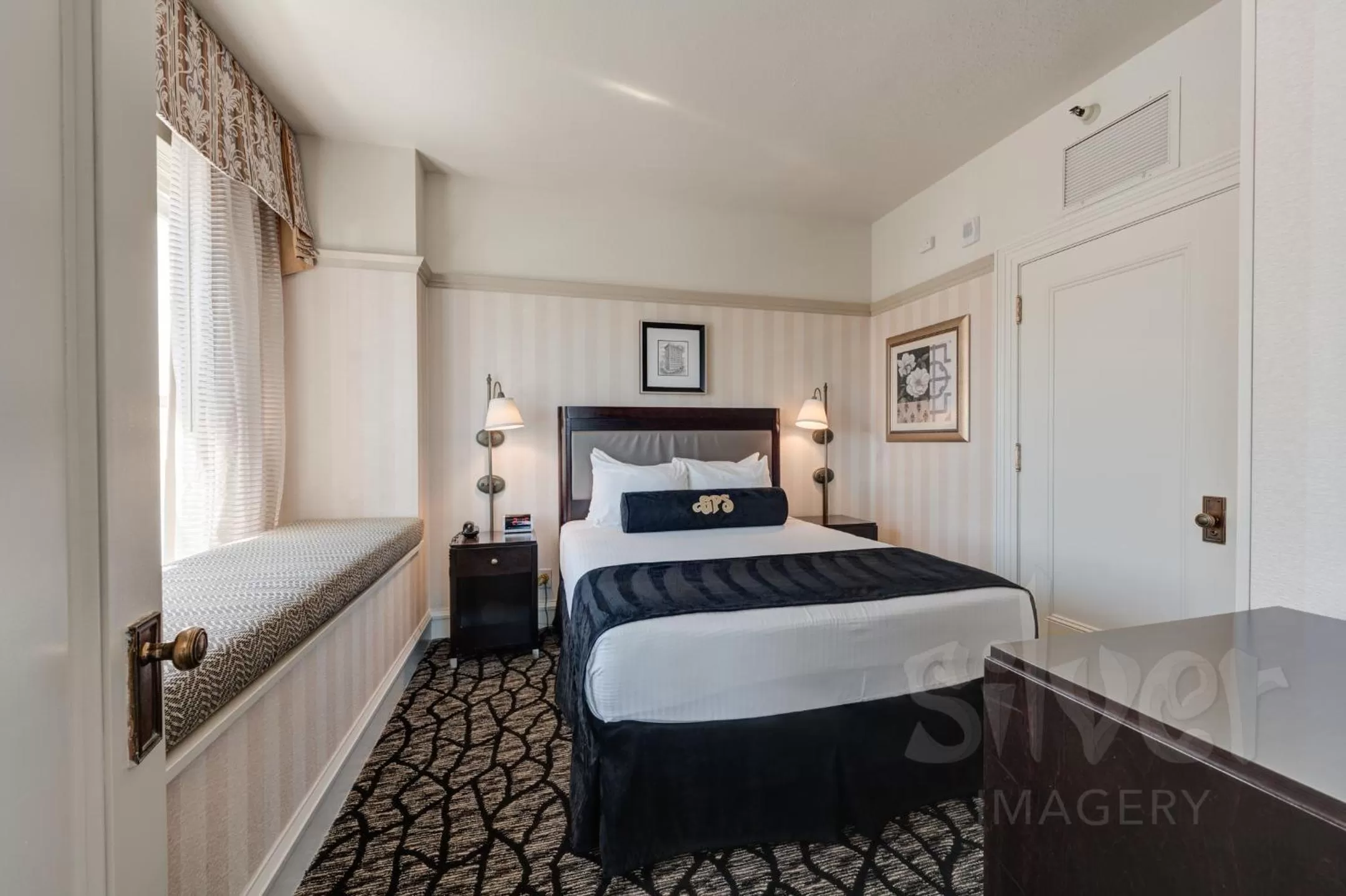 Bed in Gaslamp Plaza Suites