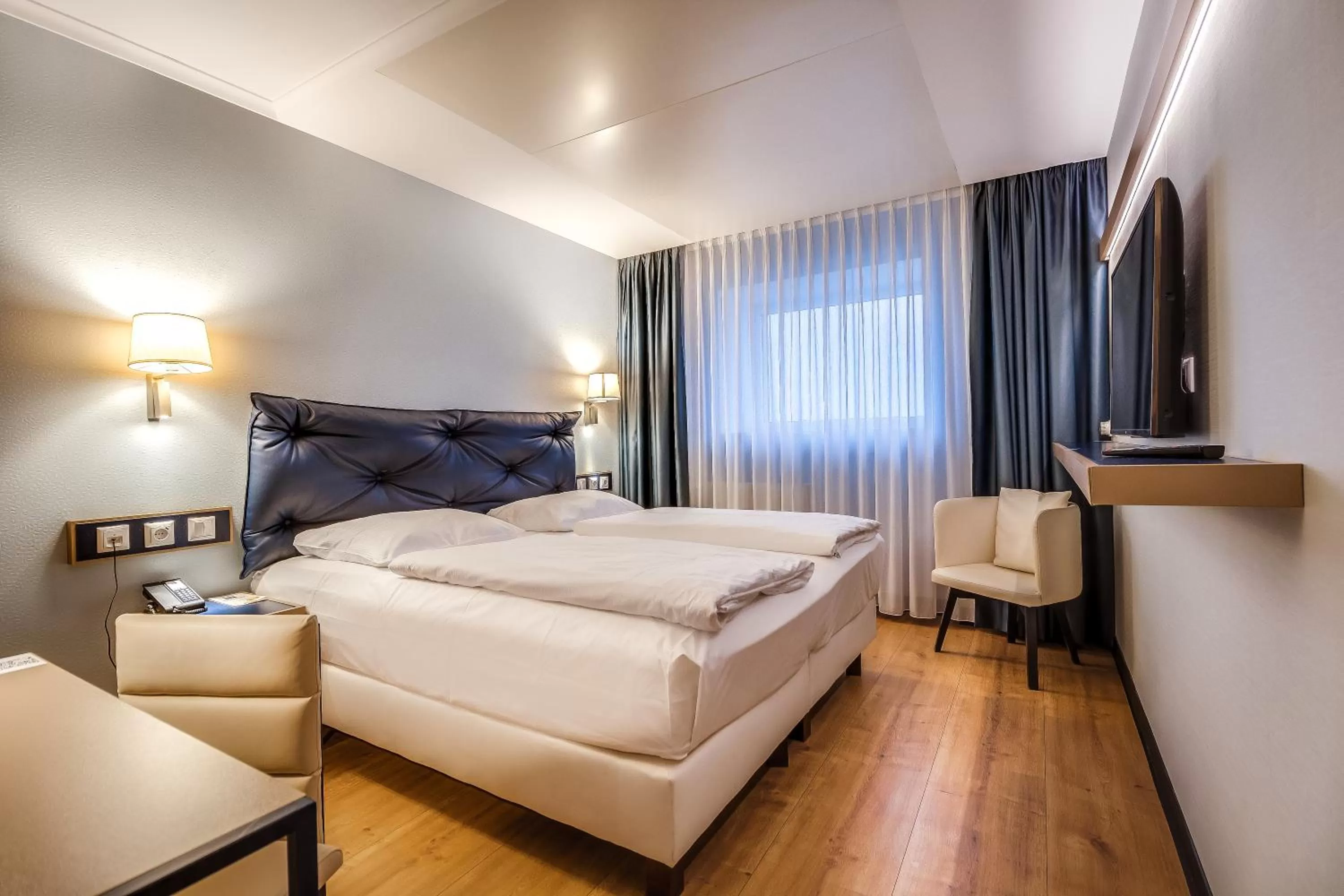 Photo of the whole room, Bed in Congress Hotel Chemnitz