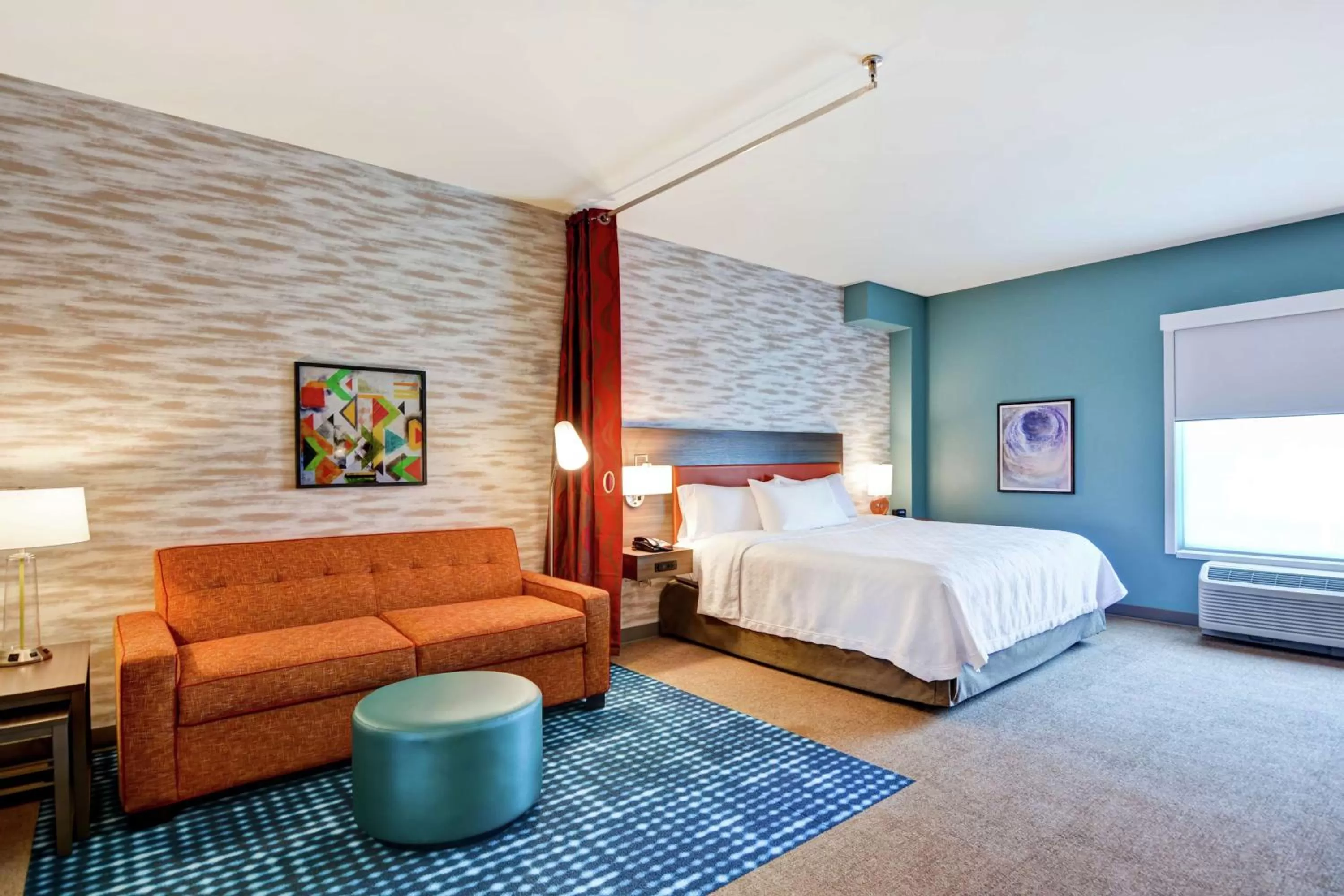 Living room, Bed in Home2 Suites By Hilton Charlotte Piper Glen