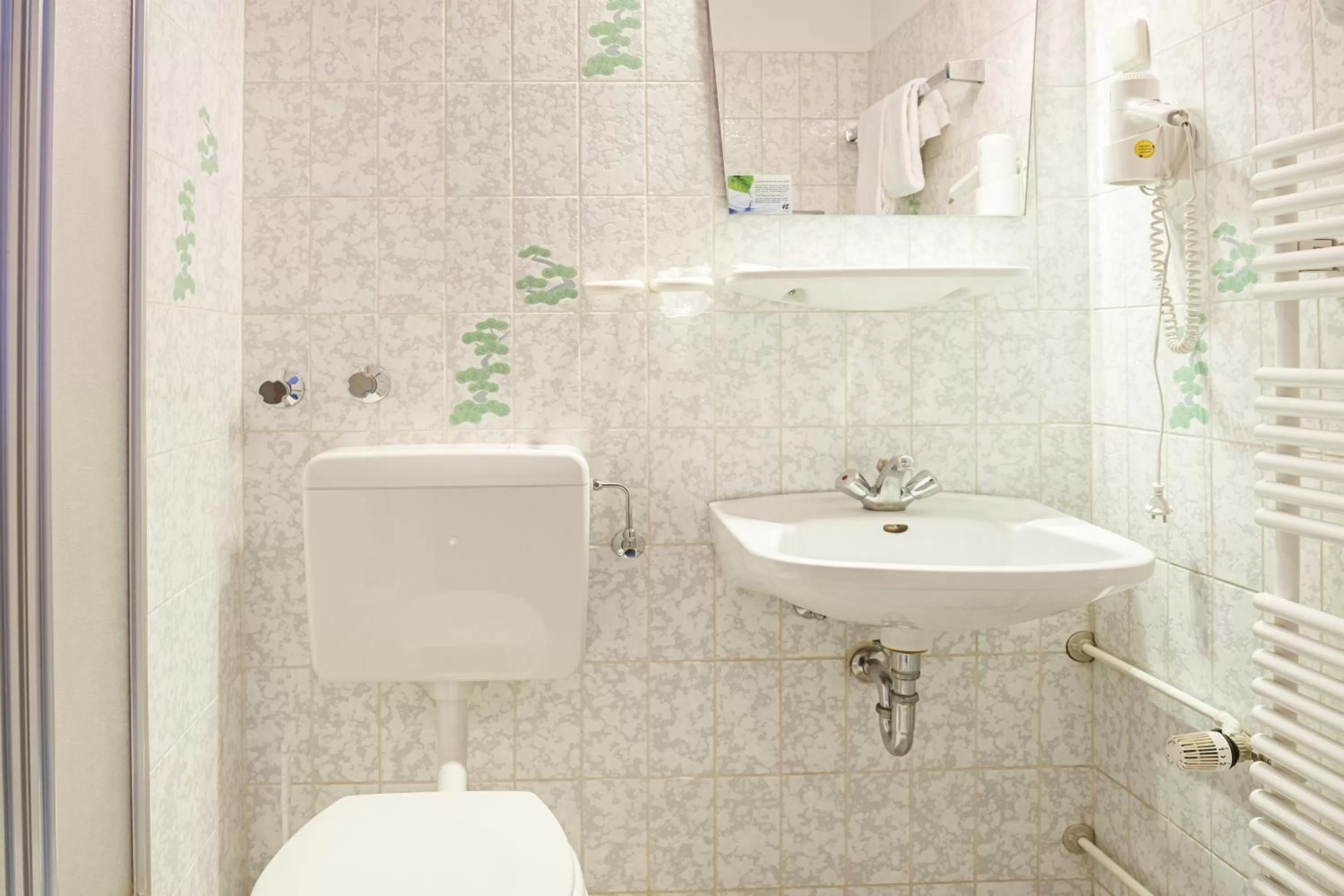 Bathroom in Hotel Hannover Airport by Premiere Classe
