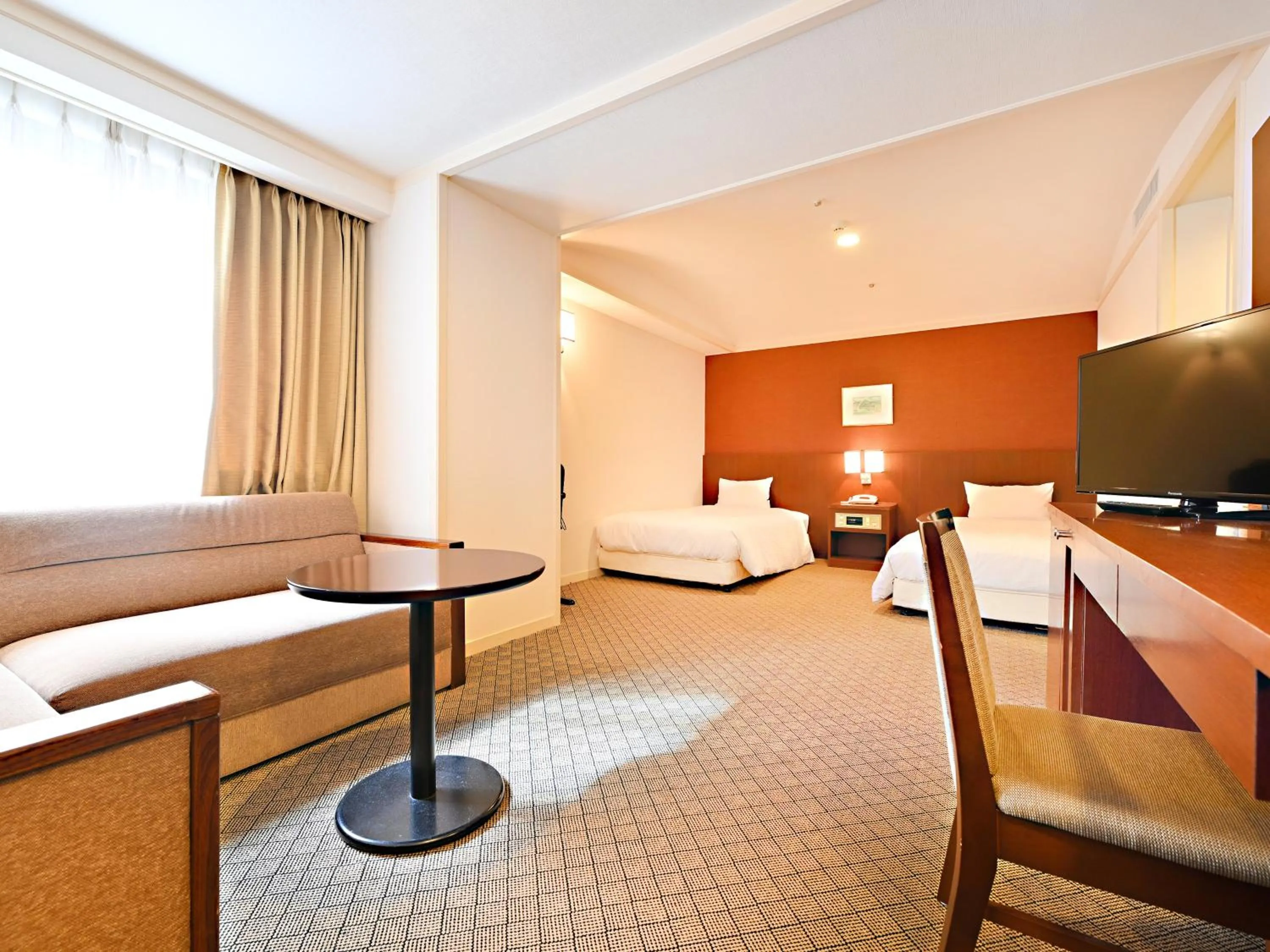 Living room, Bed in Hotel Abest Sapporo