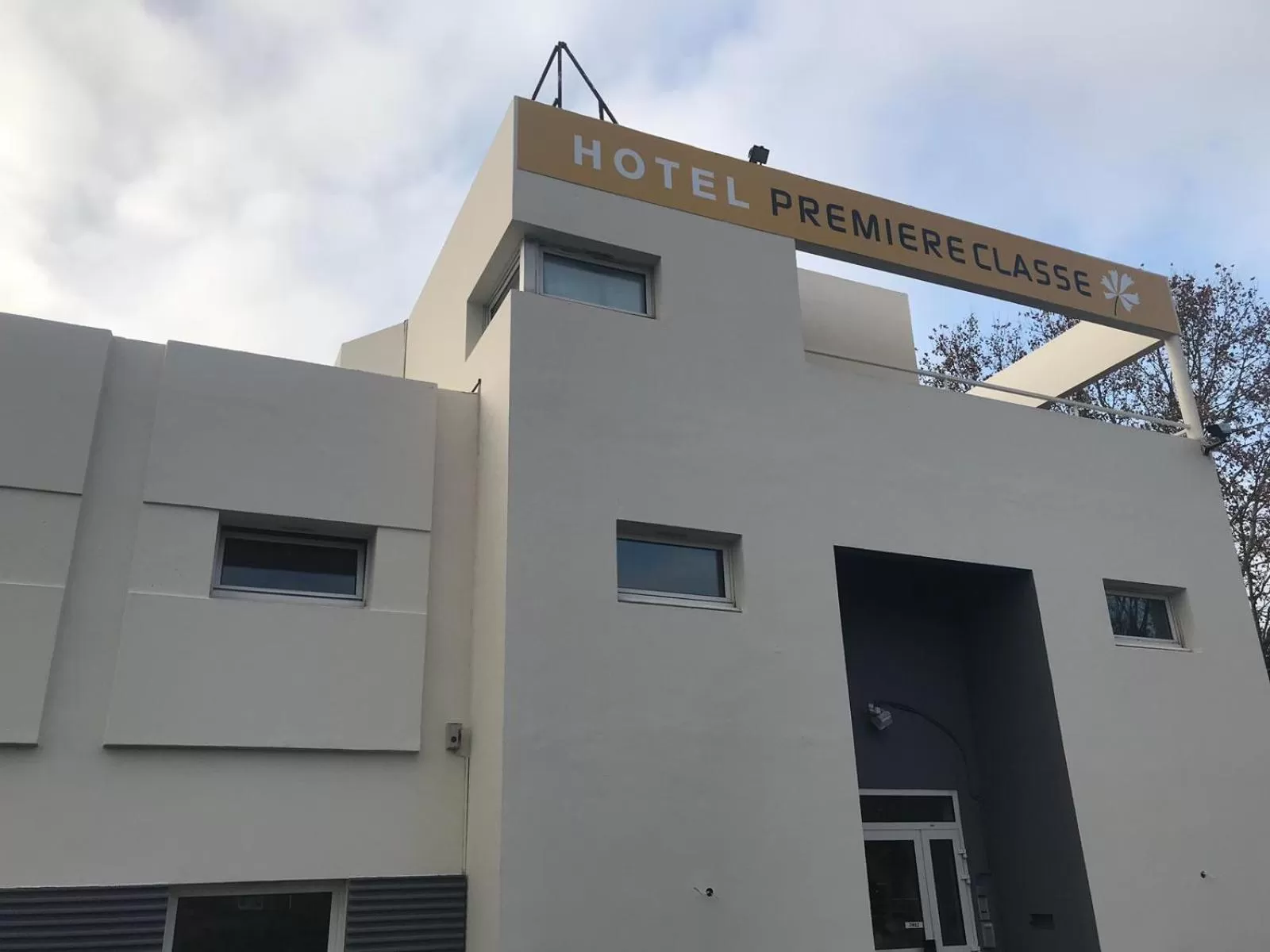 Property logo or sign in Première Classe Reims Ouest - Tinqueux