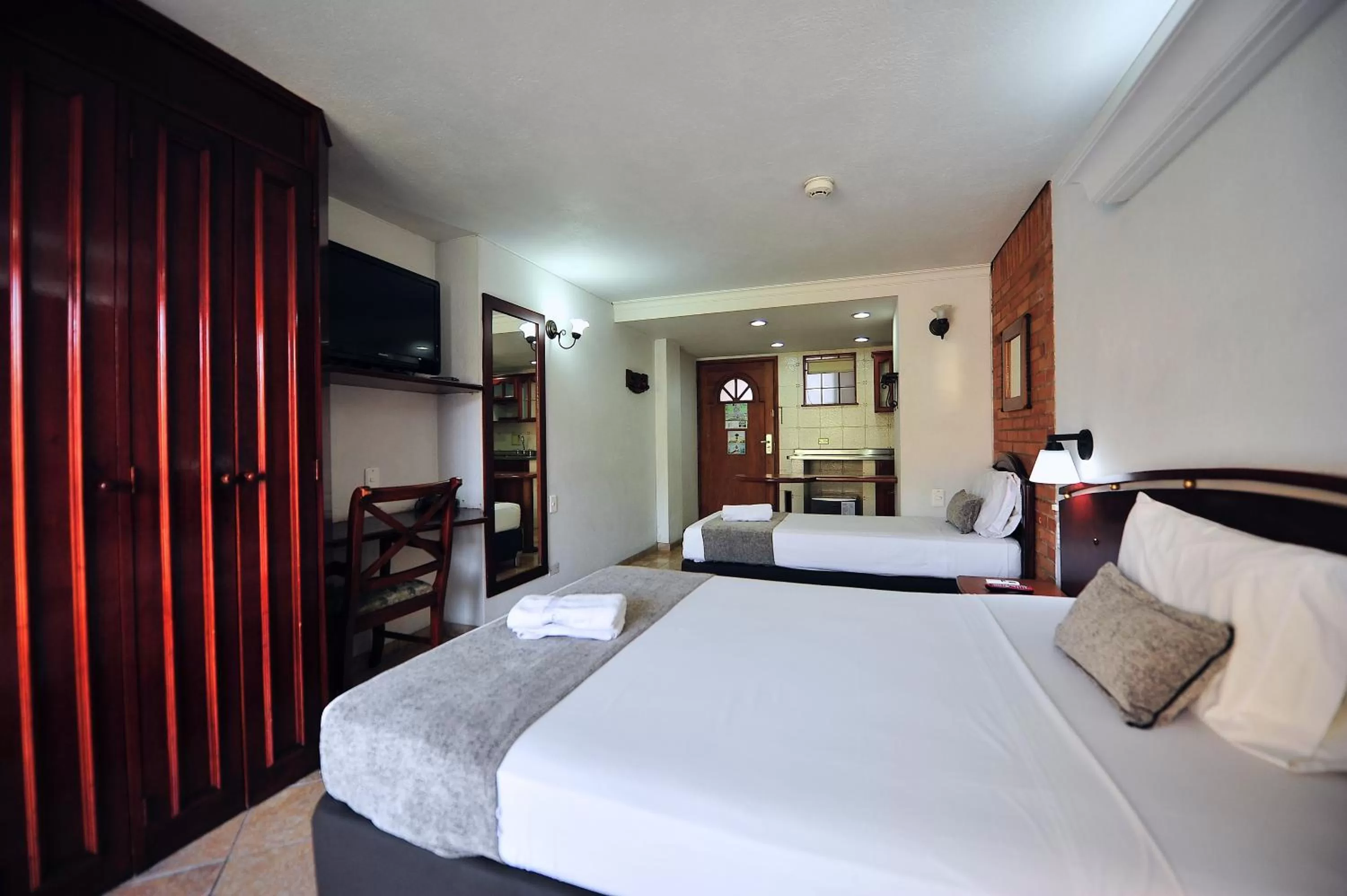 Photo of the whole room, Bed in Hotel Cabo de la Vela Medellin