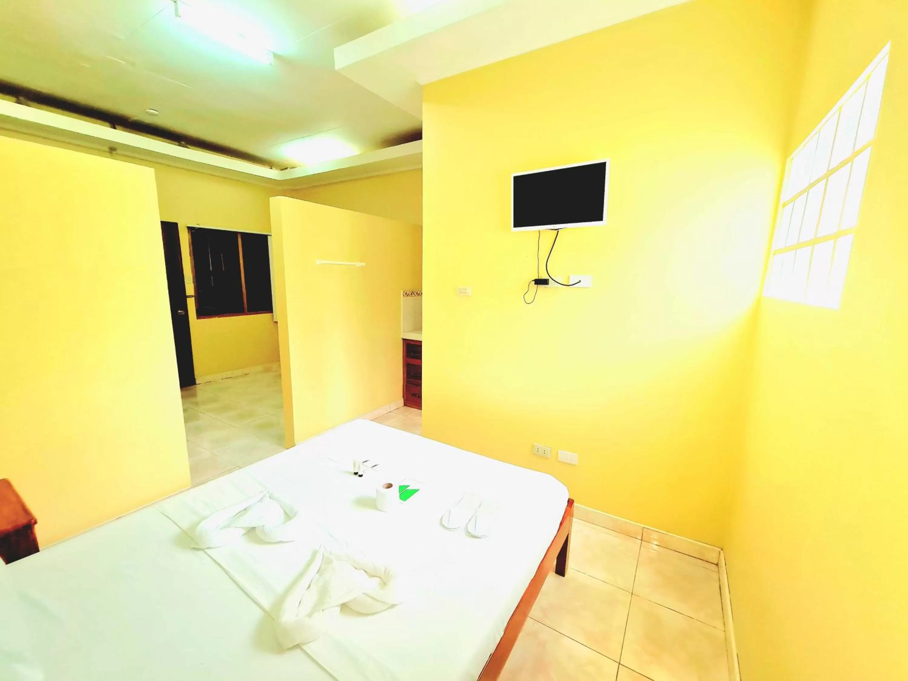 Bed in La-Familia Guest House