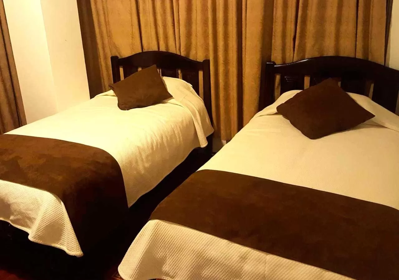 Photo of the whole room, Bed in La Merced Plaza Hostal