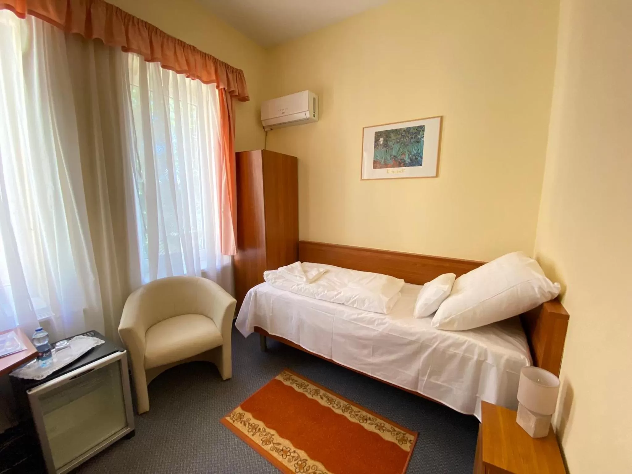 Bed in Tisza Alfa Hotel