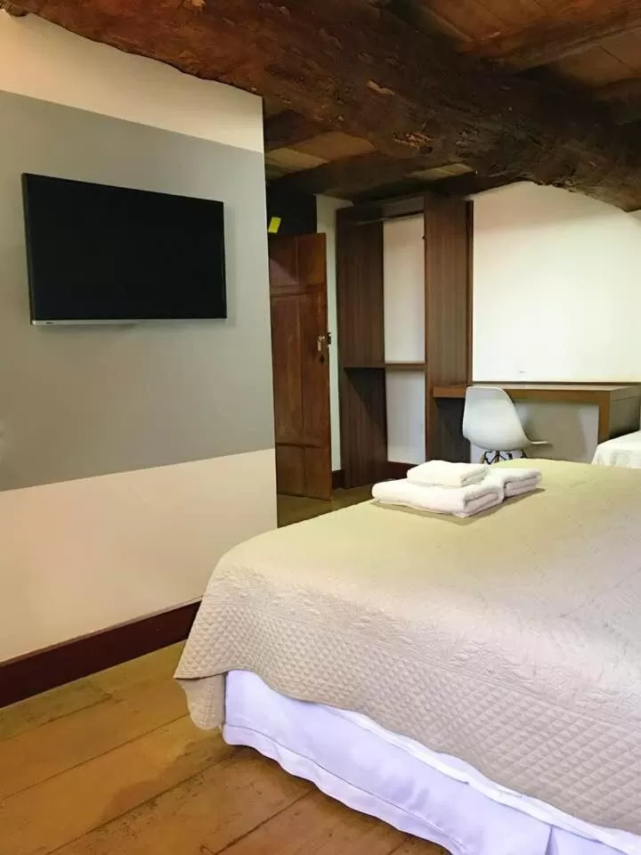 Bed in Pousada Travessia - Minas Gerais