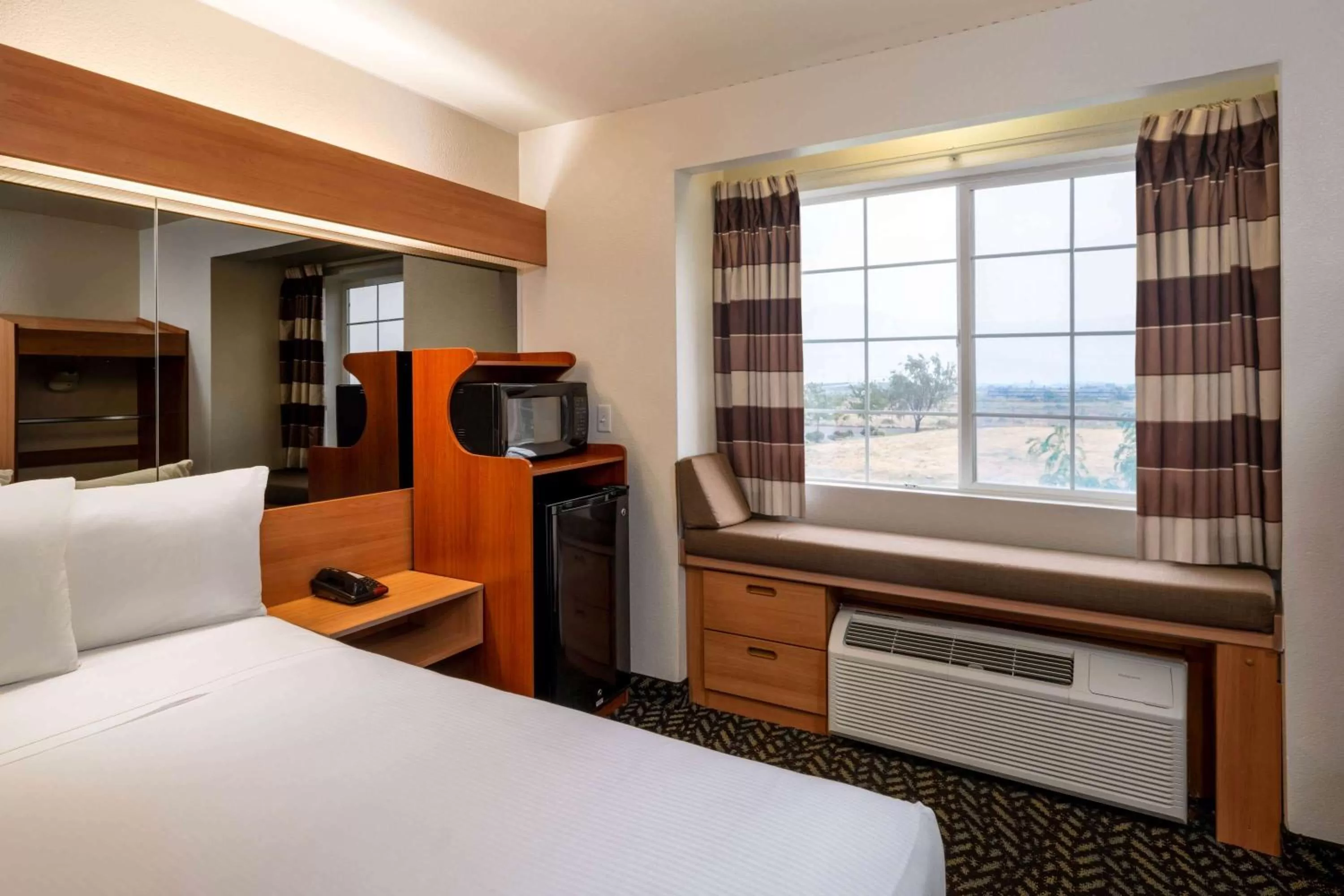 Photo of the whole room, Bed in Microtel Inn & Suites by Wyndham Salt Lake City Airport