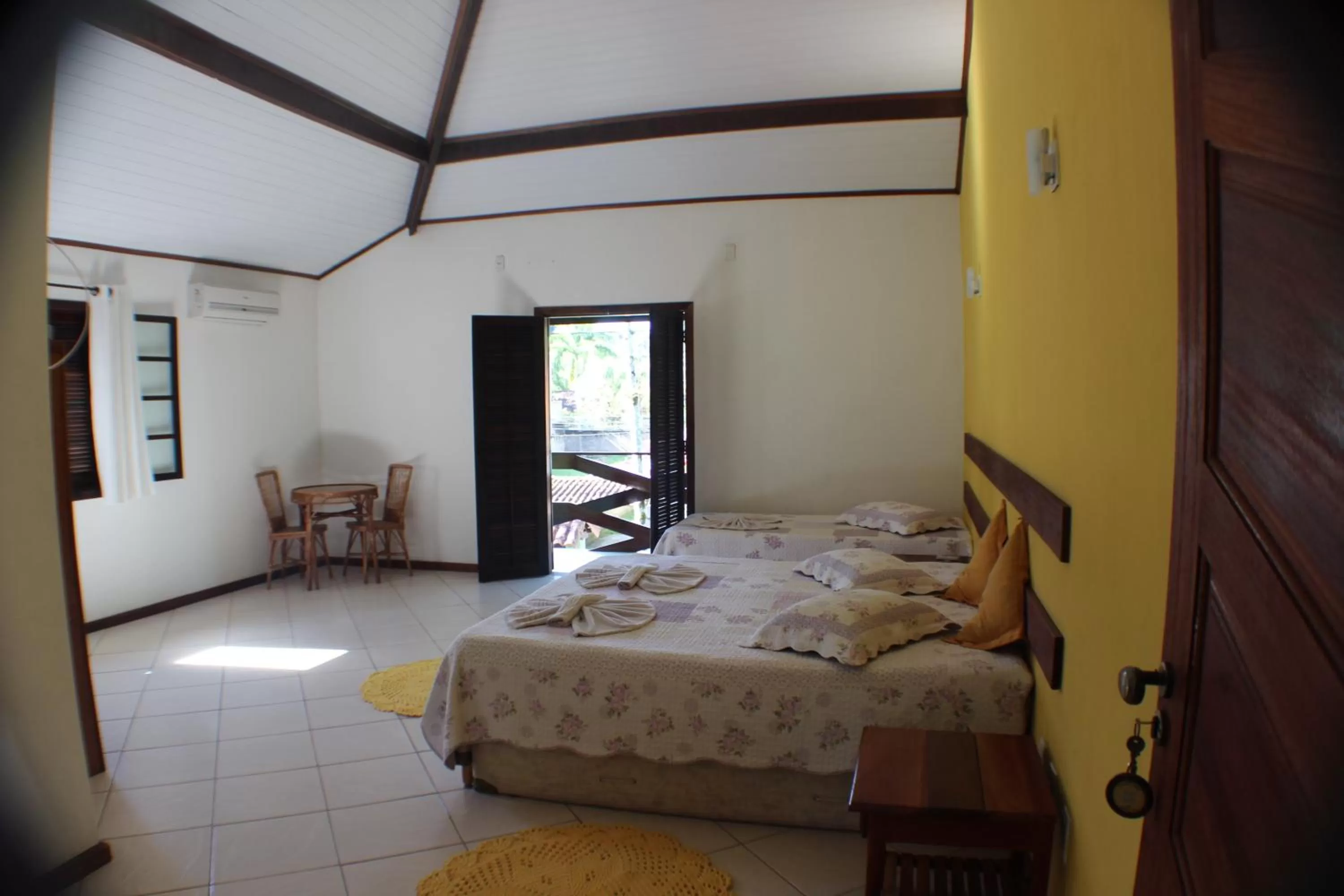 Photo of the whole room, Bed in Pousada Flor de Paraty