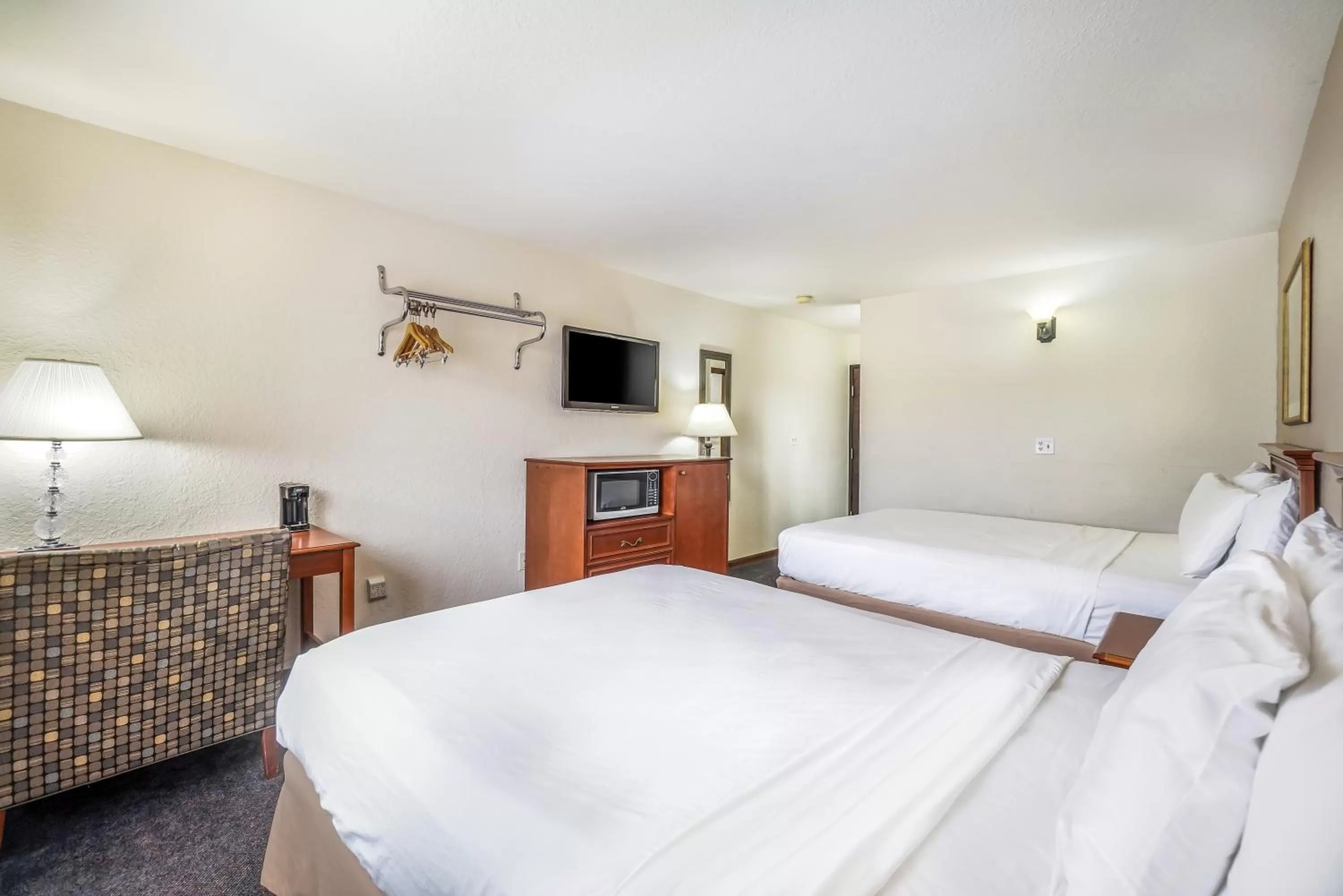 Queen Room with Two Queen Beds - Non-Smoking in Americas Best Value Inn Marquette