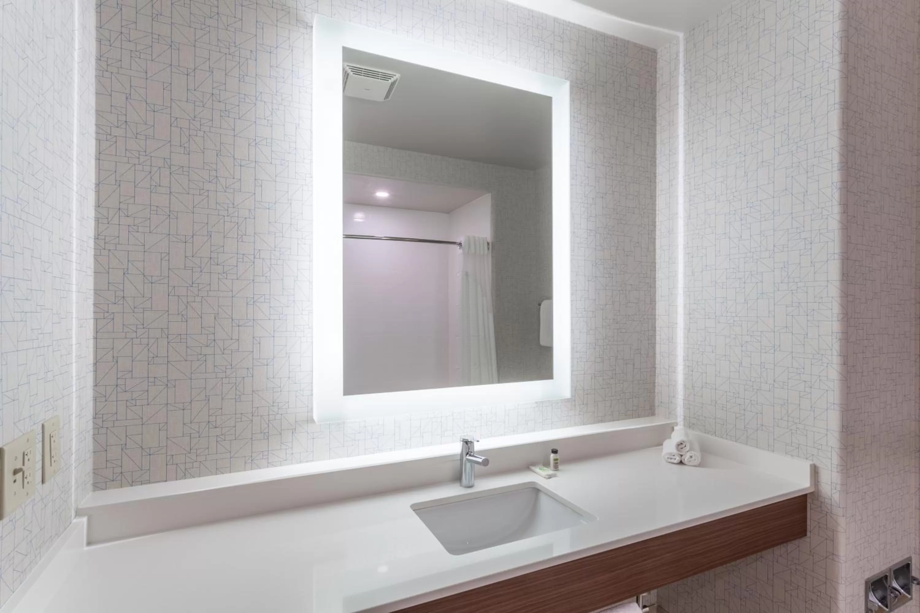 Bathroom in Holiday Inn Express Rockford-Loves Park by IHG