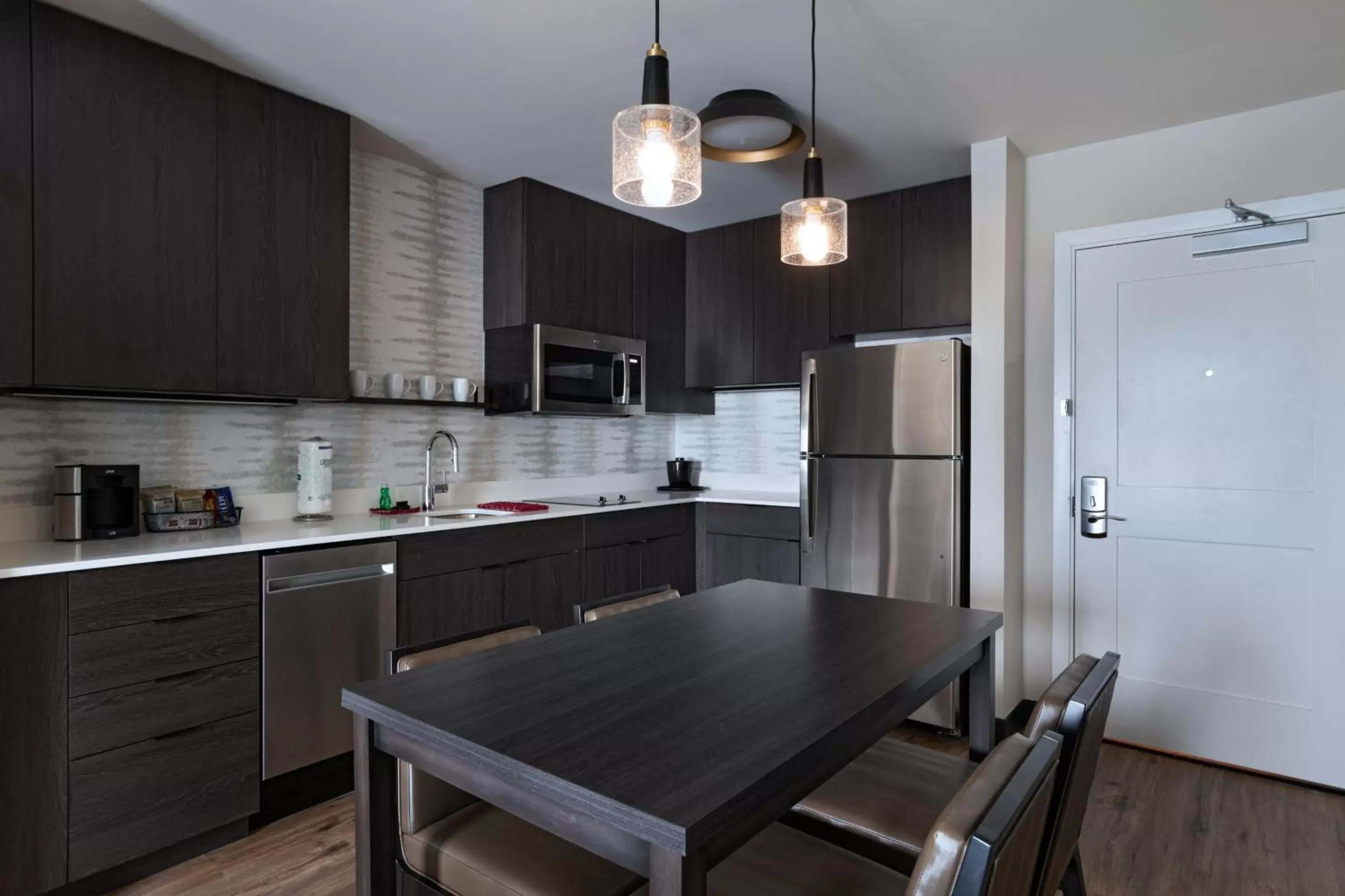 One-Bedroom Suite with Two Queen Beds, Sofa Bed and Adapted Tub - Mobility and Hearing Accessible in Residence Inn New Brunswick Tower Center Blvd. One-Bedroom Suite with Two Queen Beds, Sofa Bed and Adapted Tub - Mobility and Hearing Accessible in Residence Inn New Brunswick Tower Center Blvd.