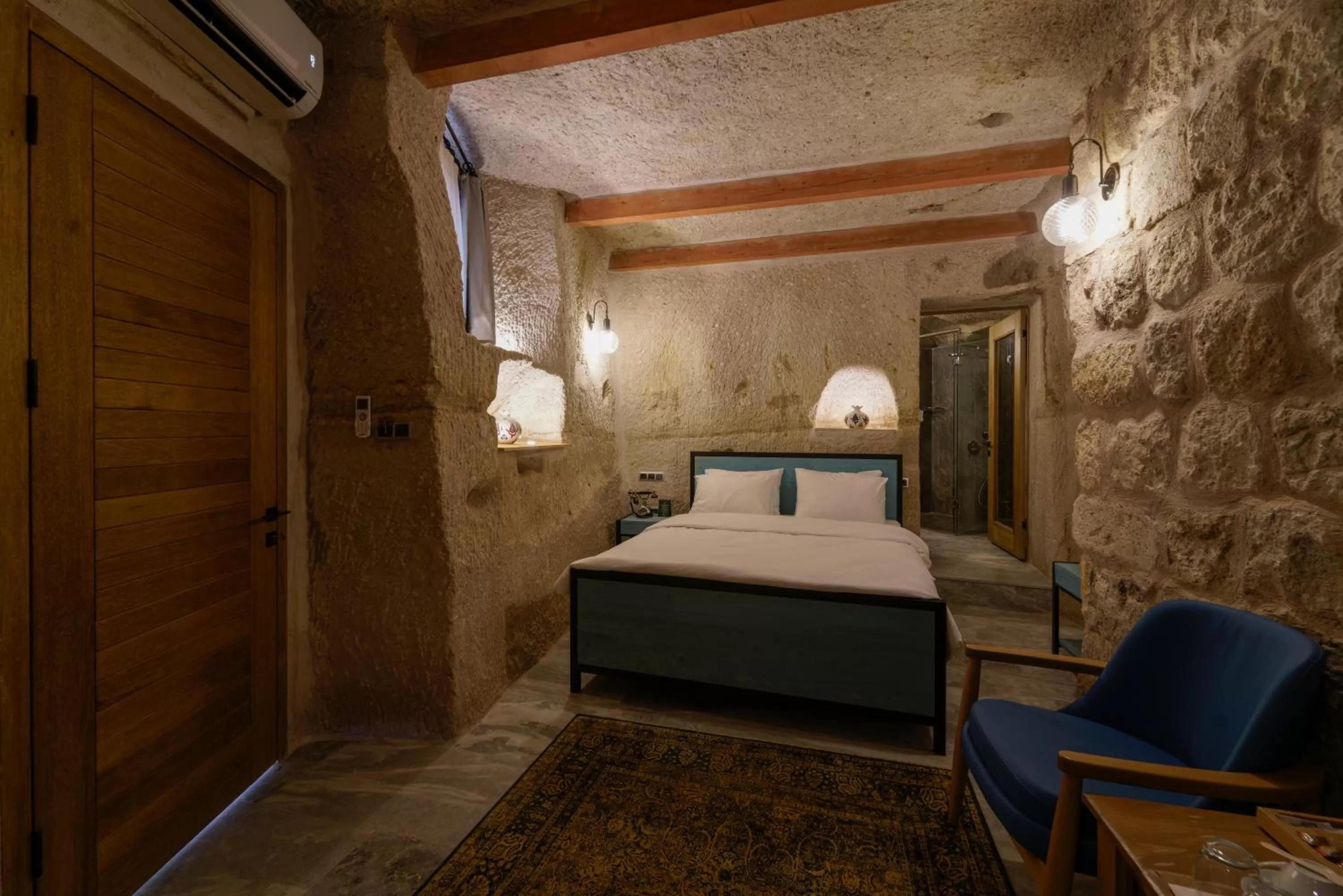 Bed in The Niche Cave Hotel