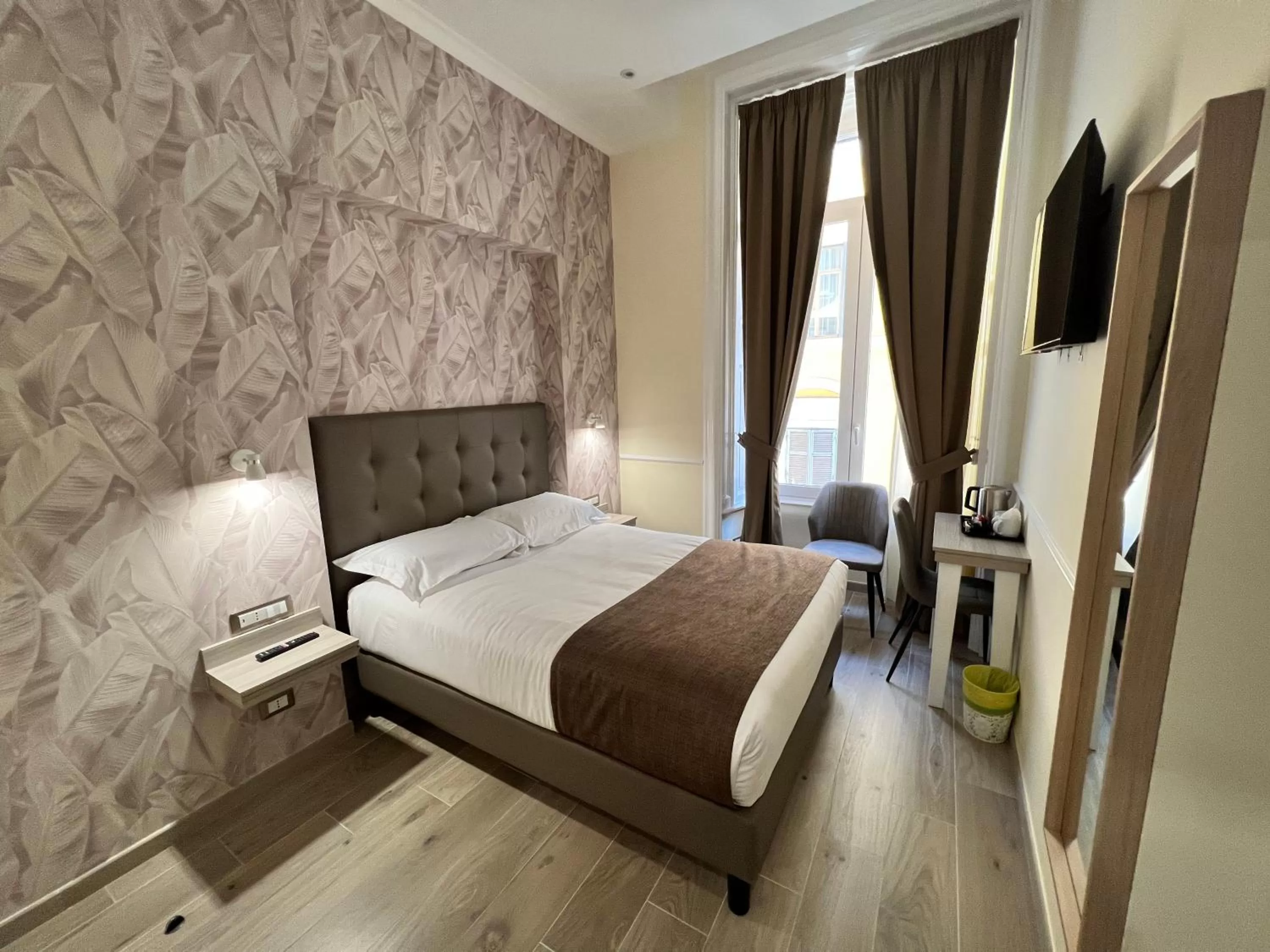 Bed in Hotel Le Petit