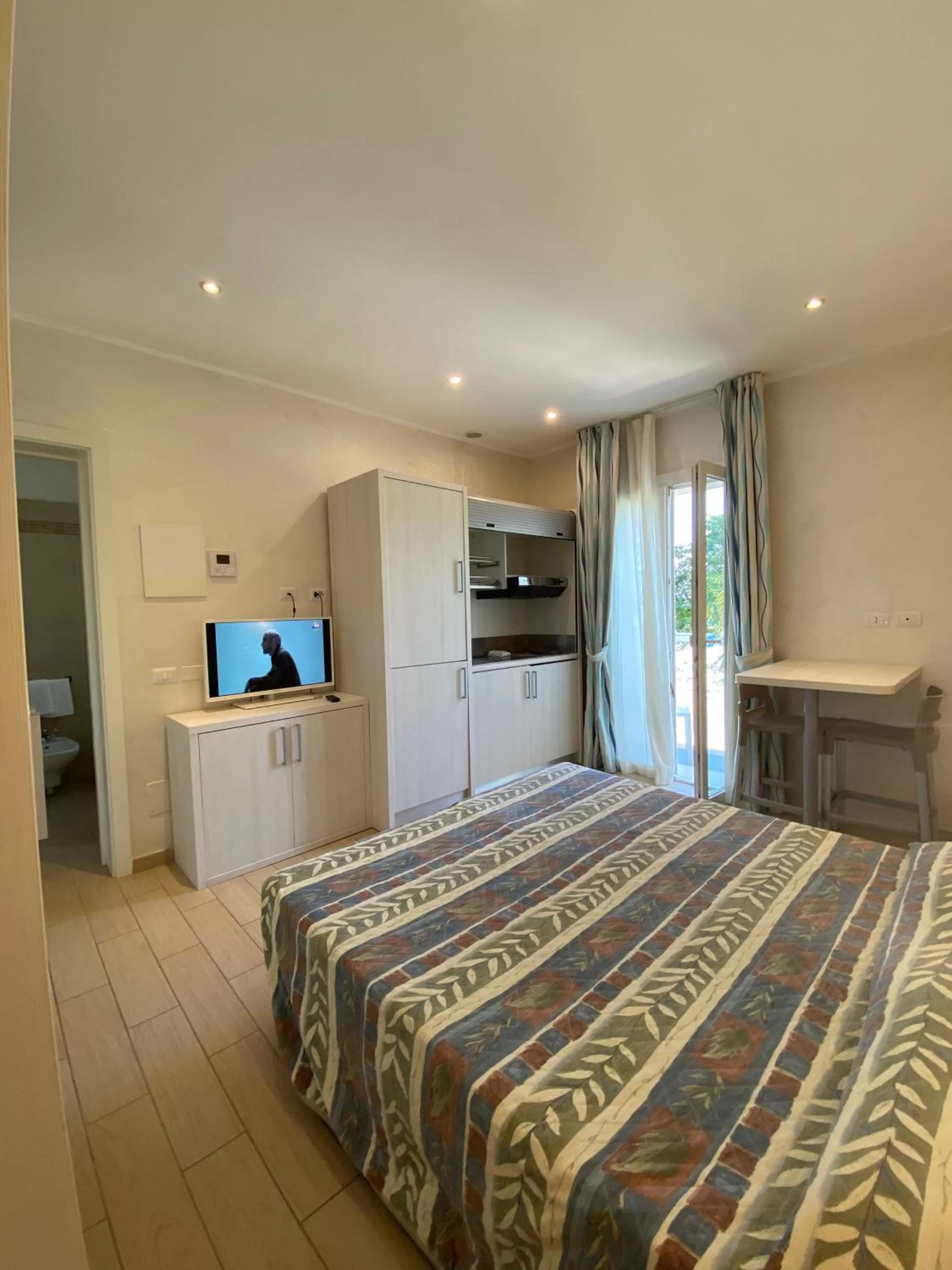 Bedroom, Bed in Marina Beach Suite Hotel