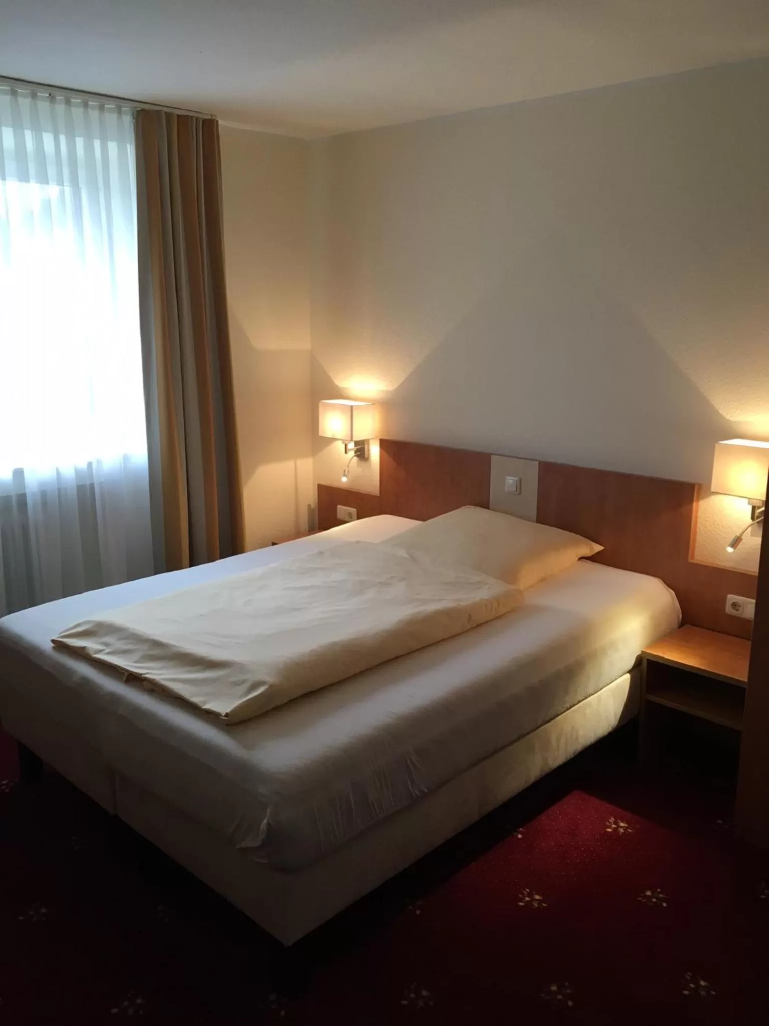 Photo of the whole room, Bed in tauwerk Hotel