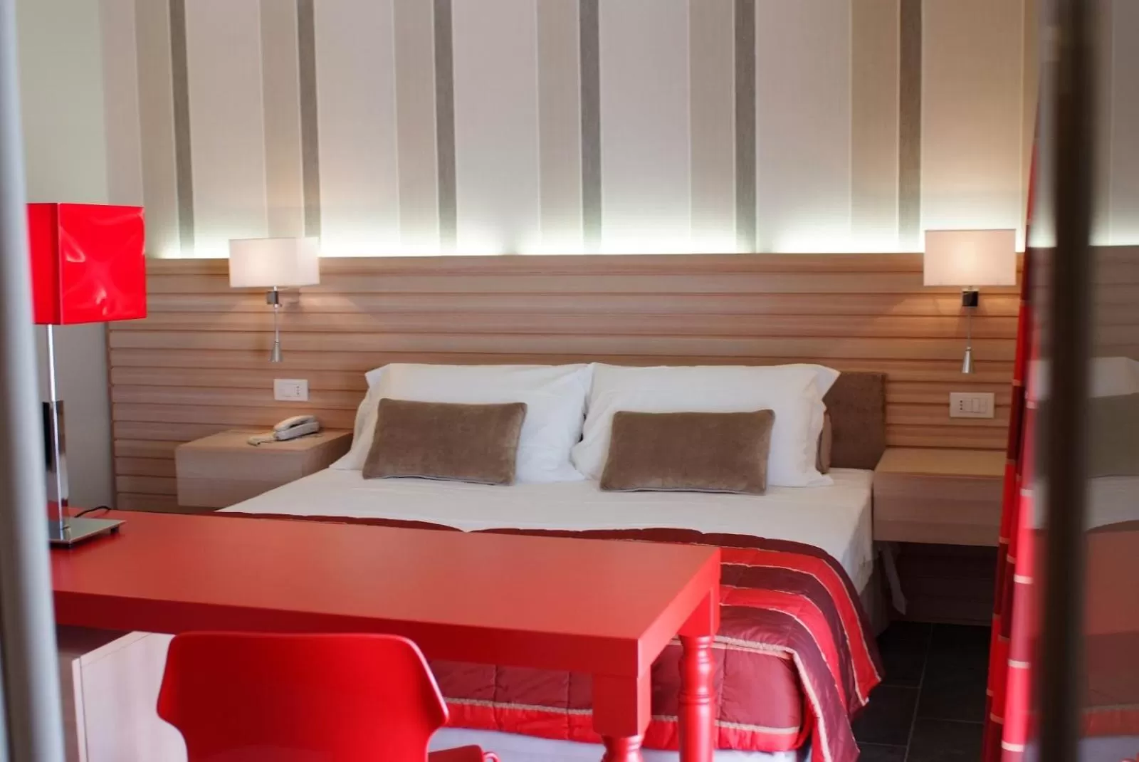 Bed in El Homs Palace Hotel