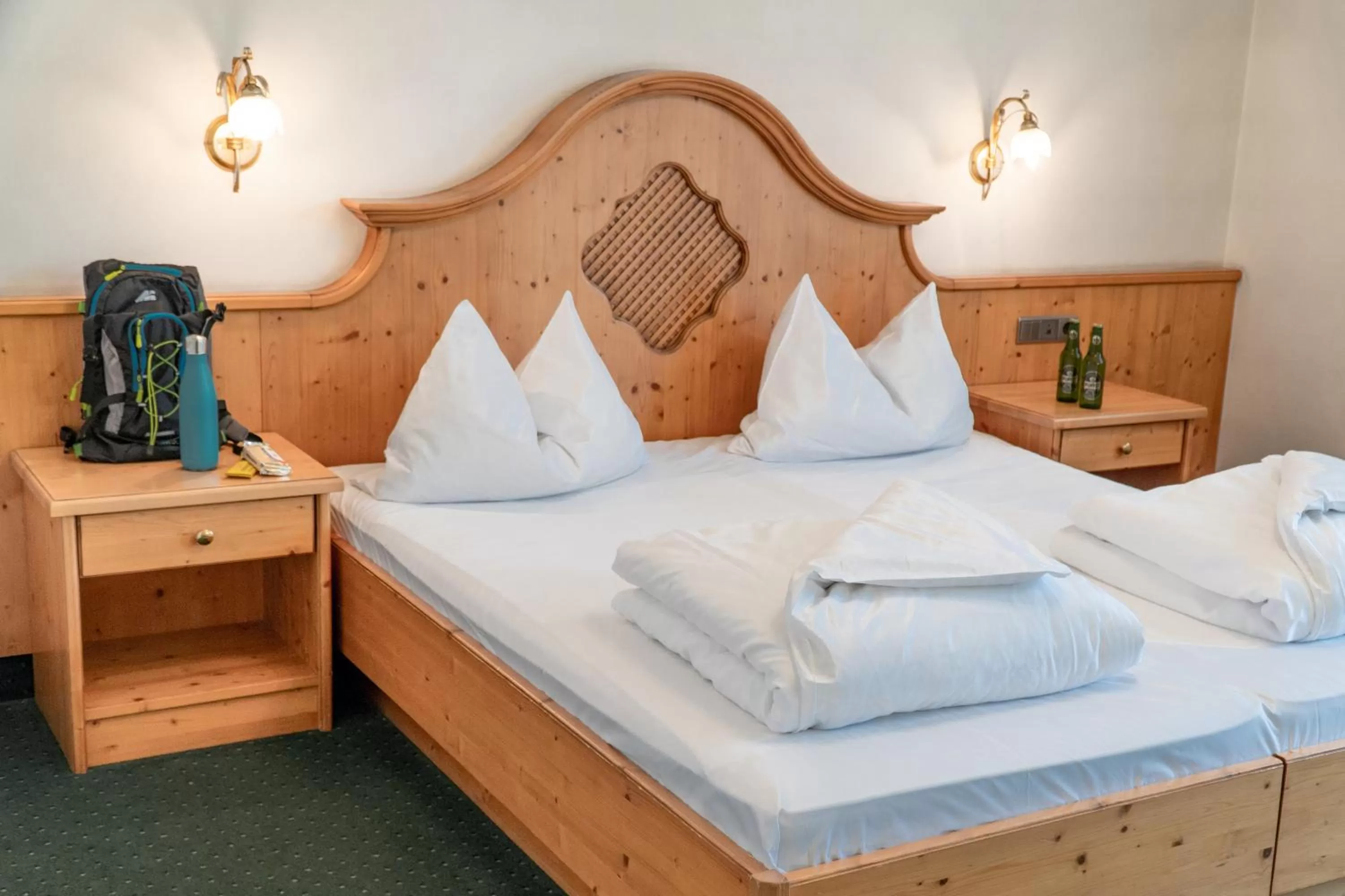 Bedroom, Bed in Hotel Wochtla Buam Aktivhotel am Kronplatz mit Sauna