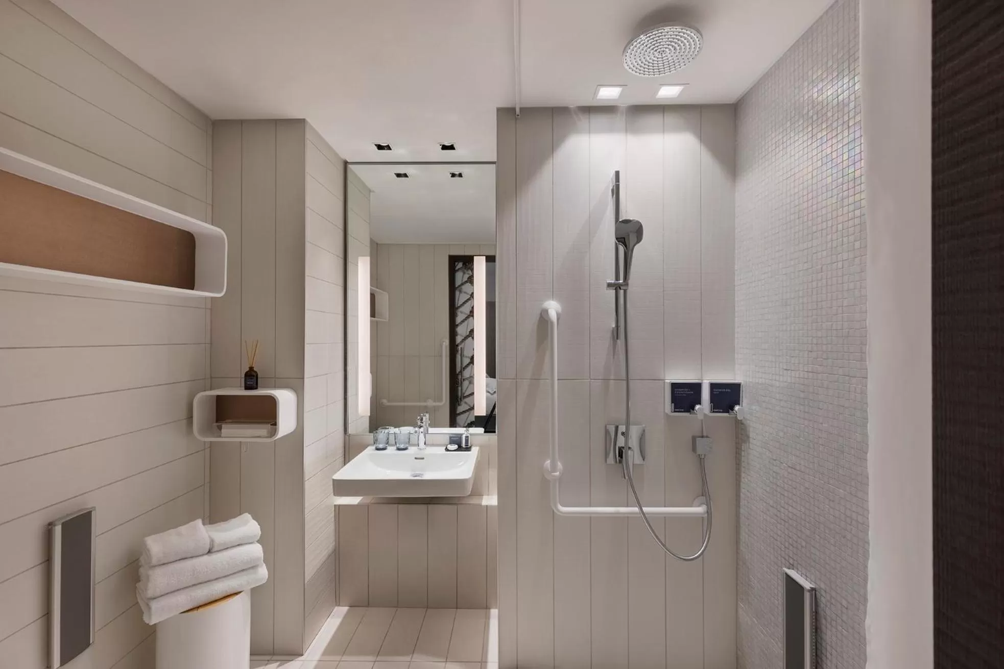 Bathroom in Port Tower by Isrotel Design