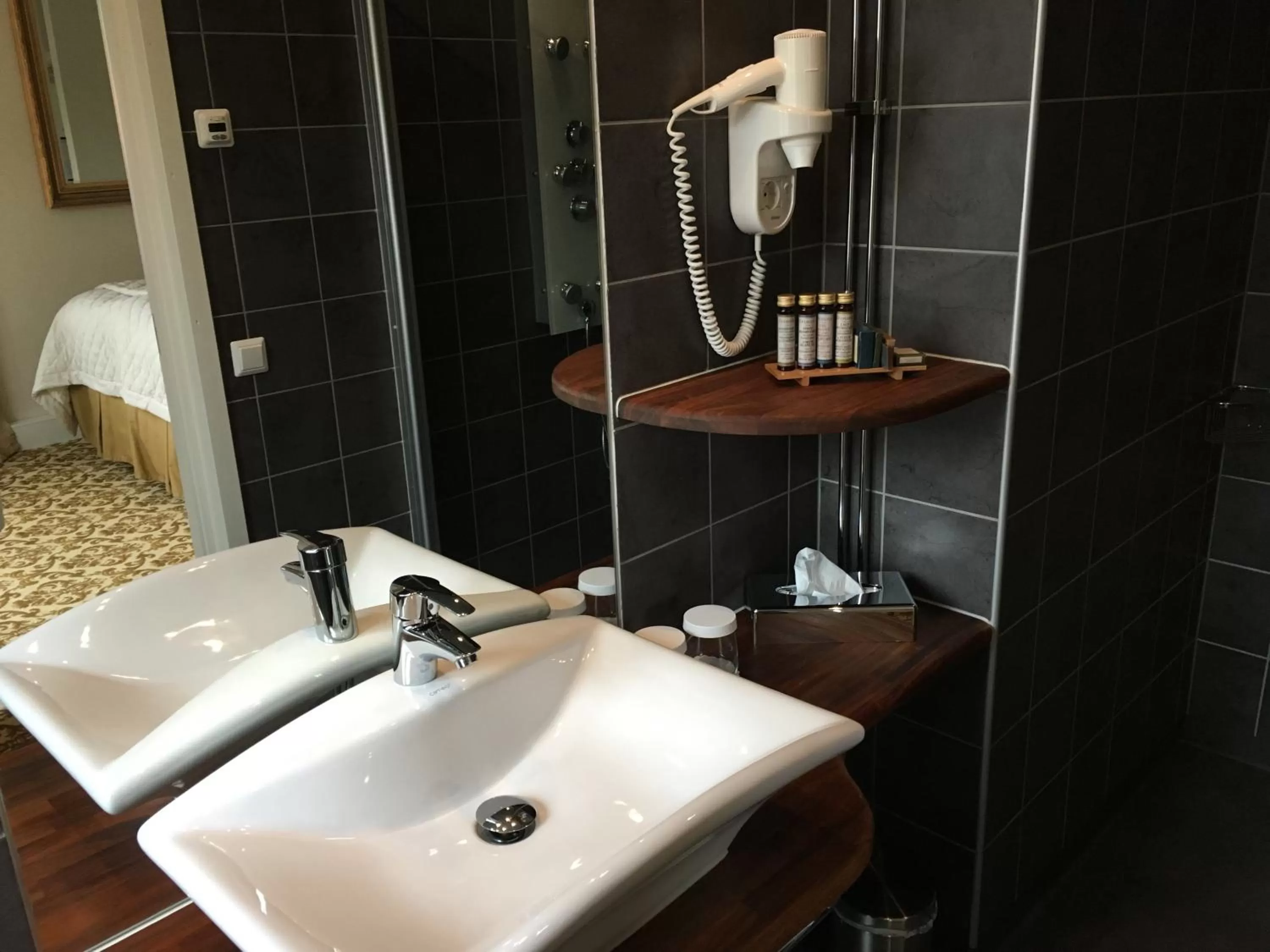 Bathroom in Sockerslottet Hotell