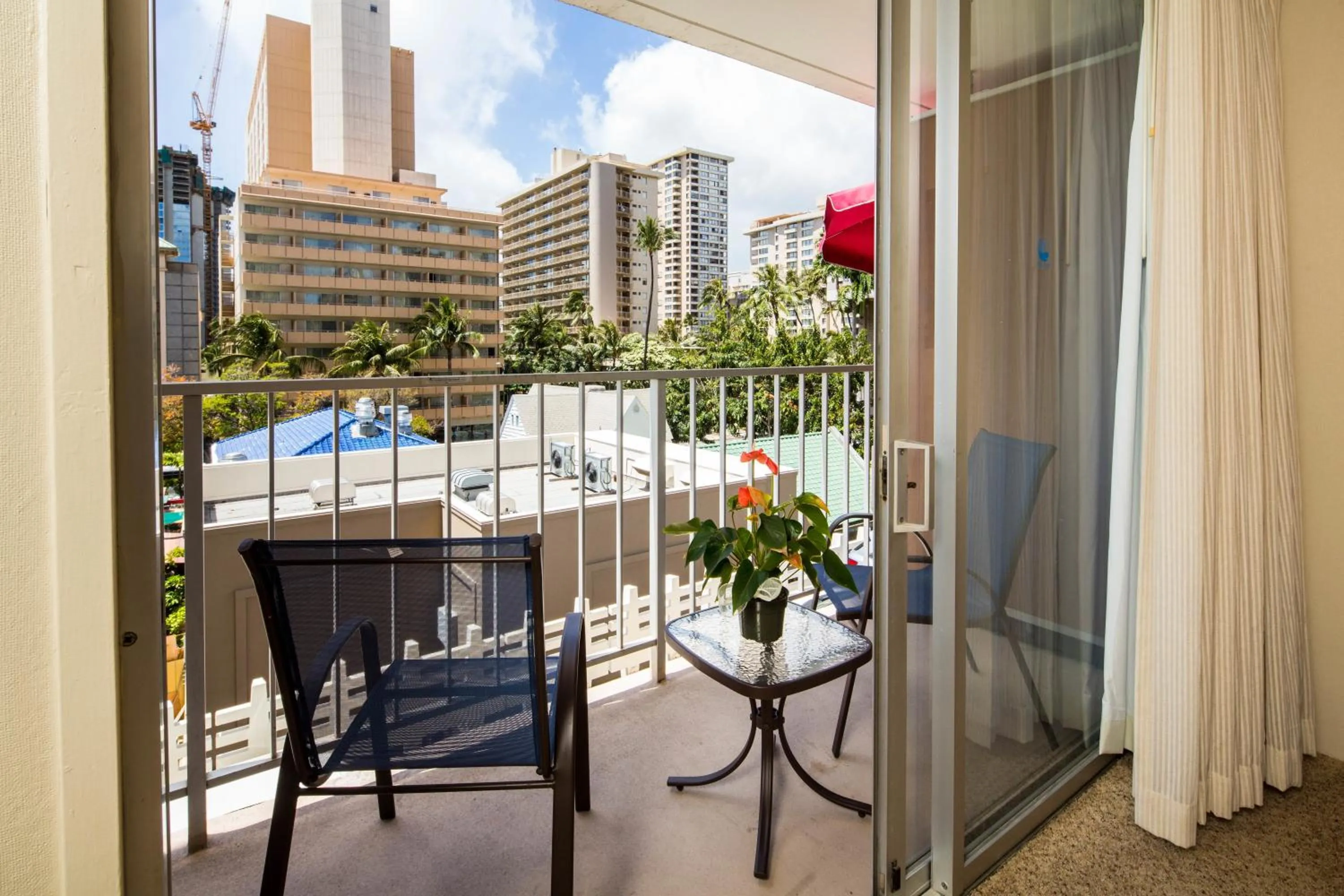 Patio in Tropical Studios at Marine Surf Waikiki - FREE PARKING - BEST LOCATION - FULL KITCHEN - SWIMMING POOL