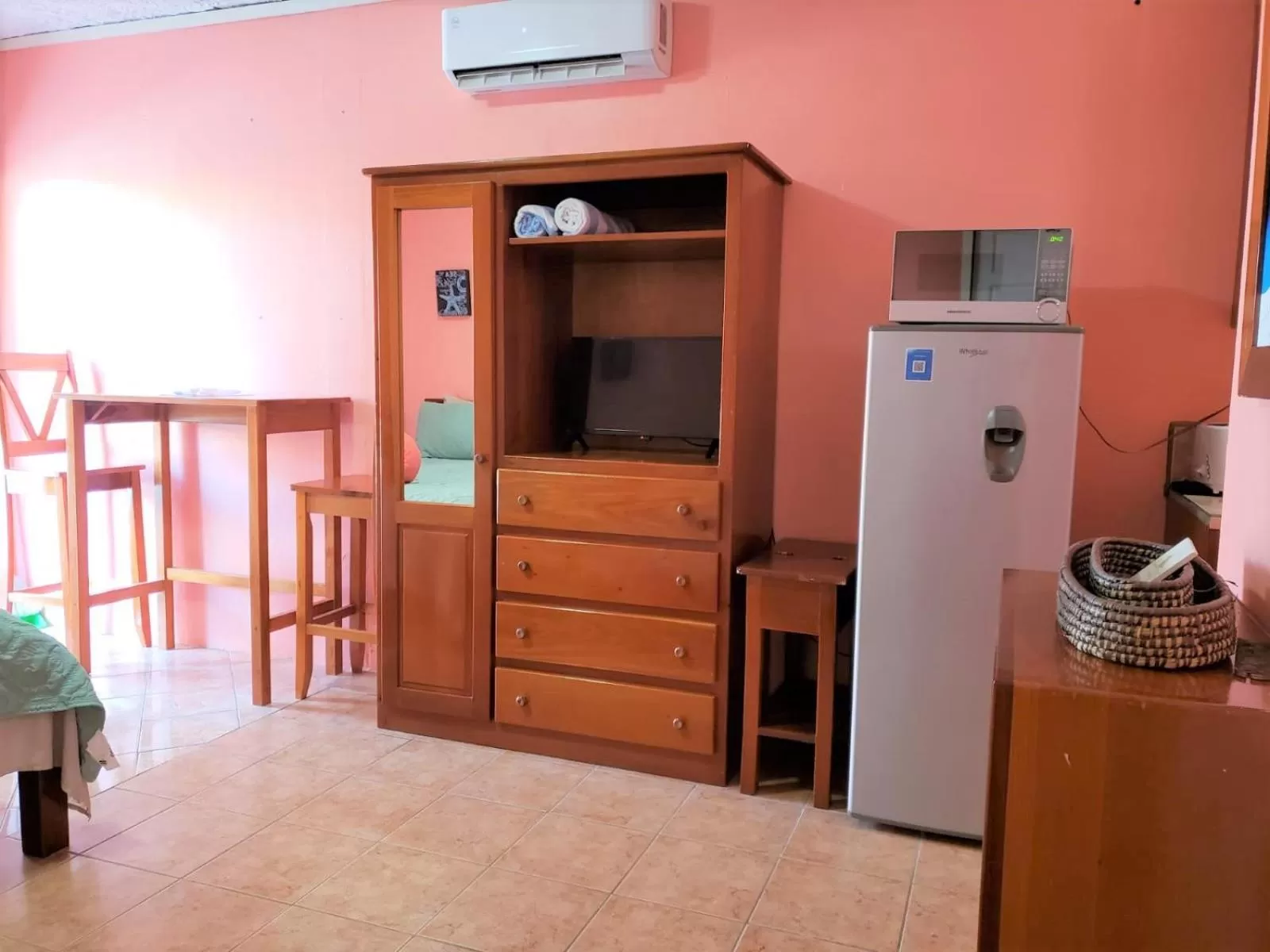 TV/Entertainment Center in Beach Side Condos Caye Caulker by CCVH