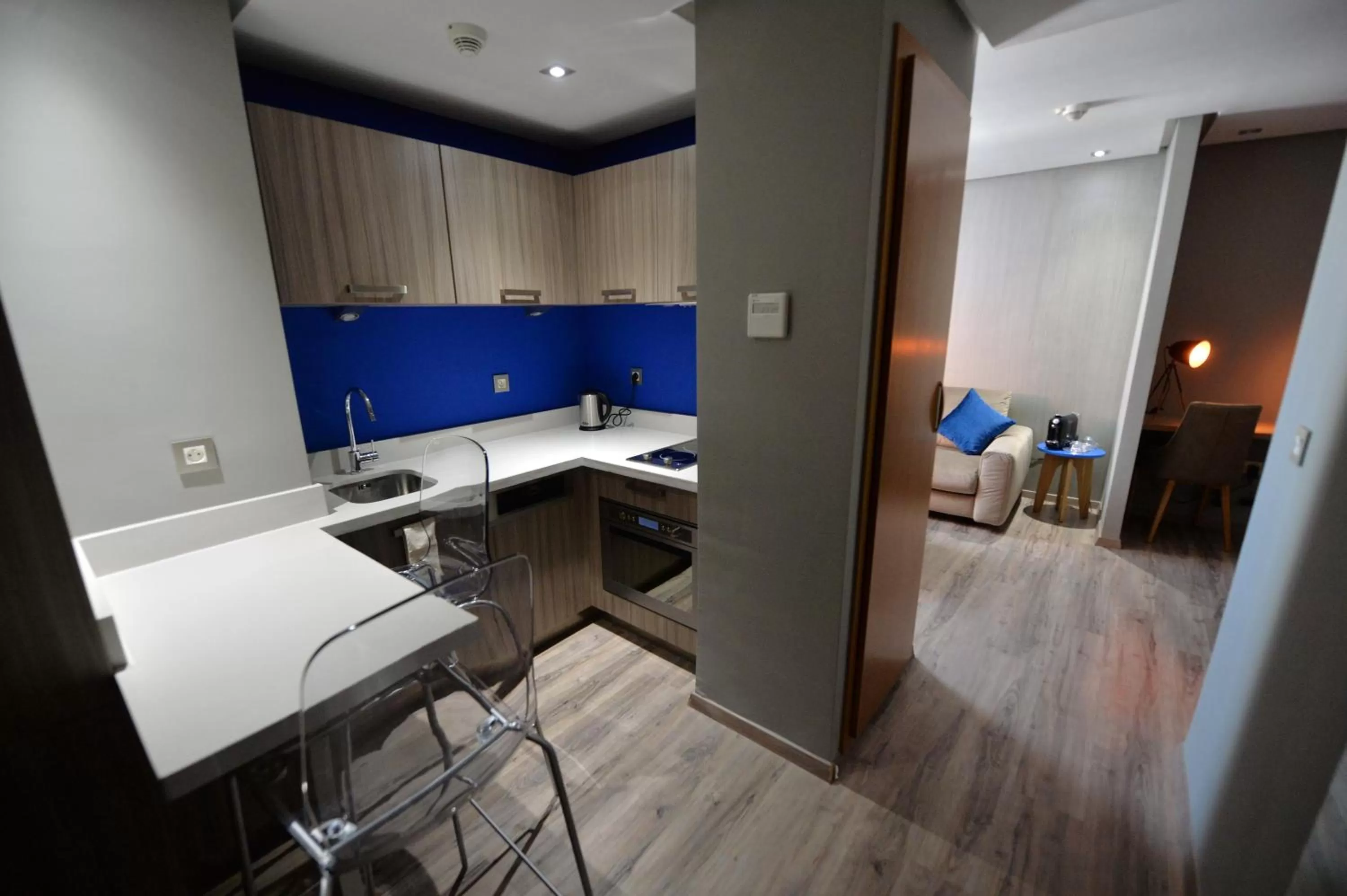 Kitchen or kitchenette in Le 22 Appart'Hotel